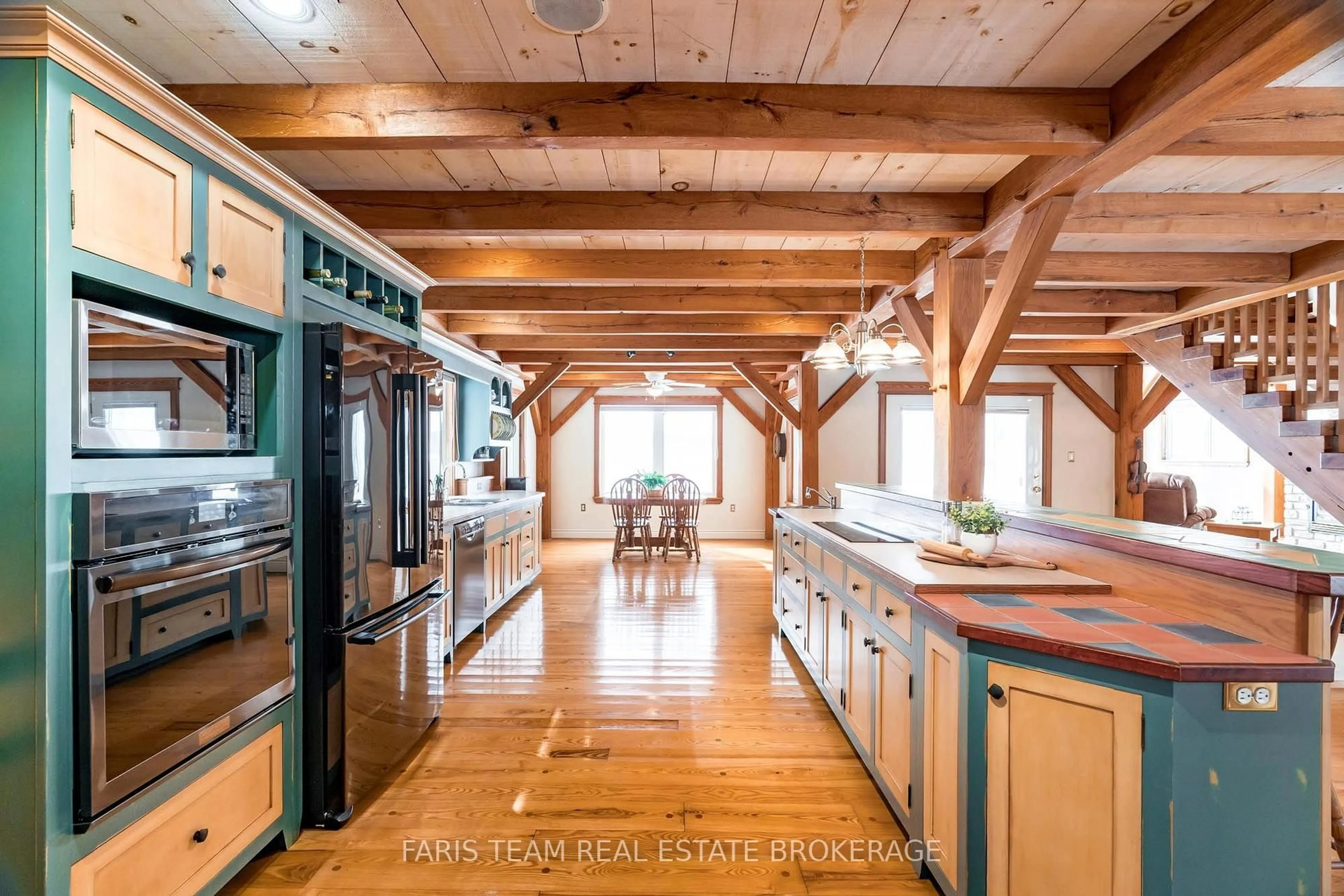 Rustic kitchen, wood/laminate floor for 187 Champlain Rd, Penetanguishene Ontario L9M 1S2