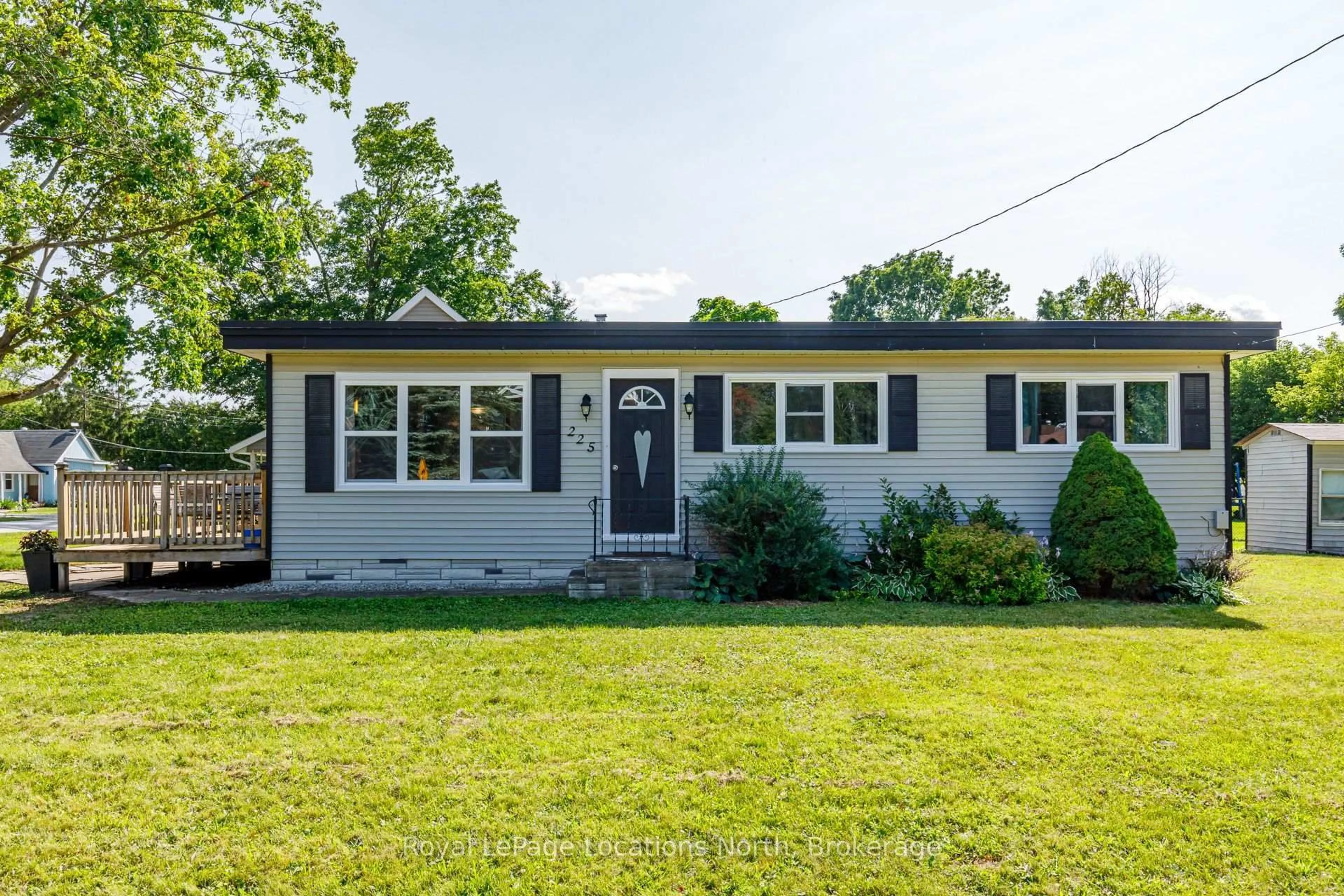 Home with vinyl exterior material, street for 225 Cherry St, Clearview Ontario L0M 1S0