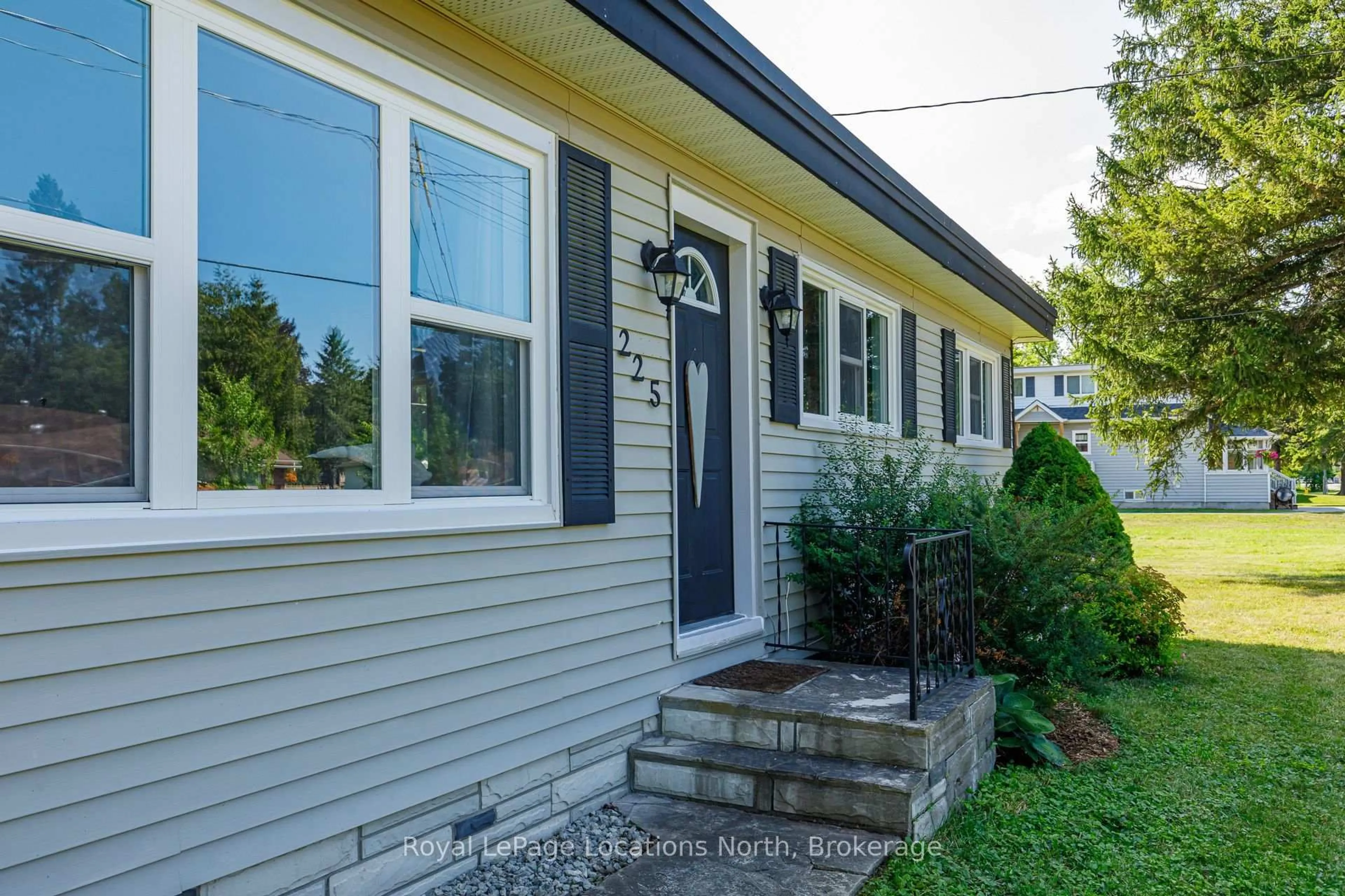 Home with vinyl exterior material, street for 225 Cherry St, Clearview Ontario L0M 1S0