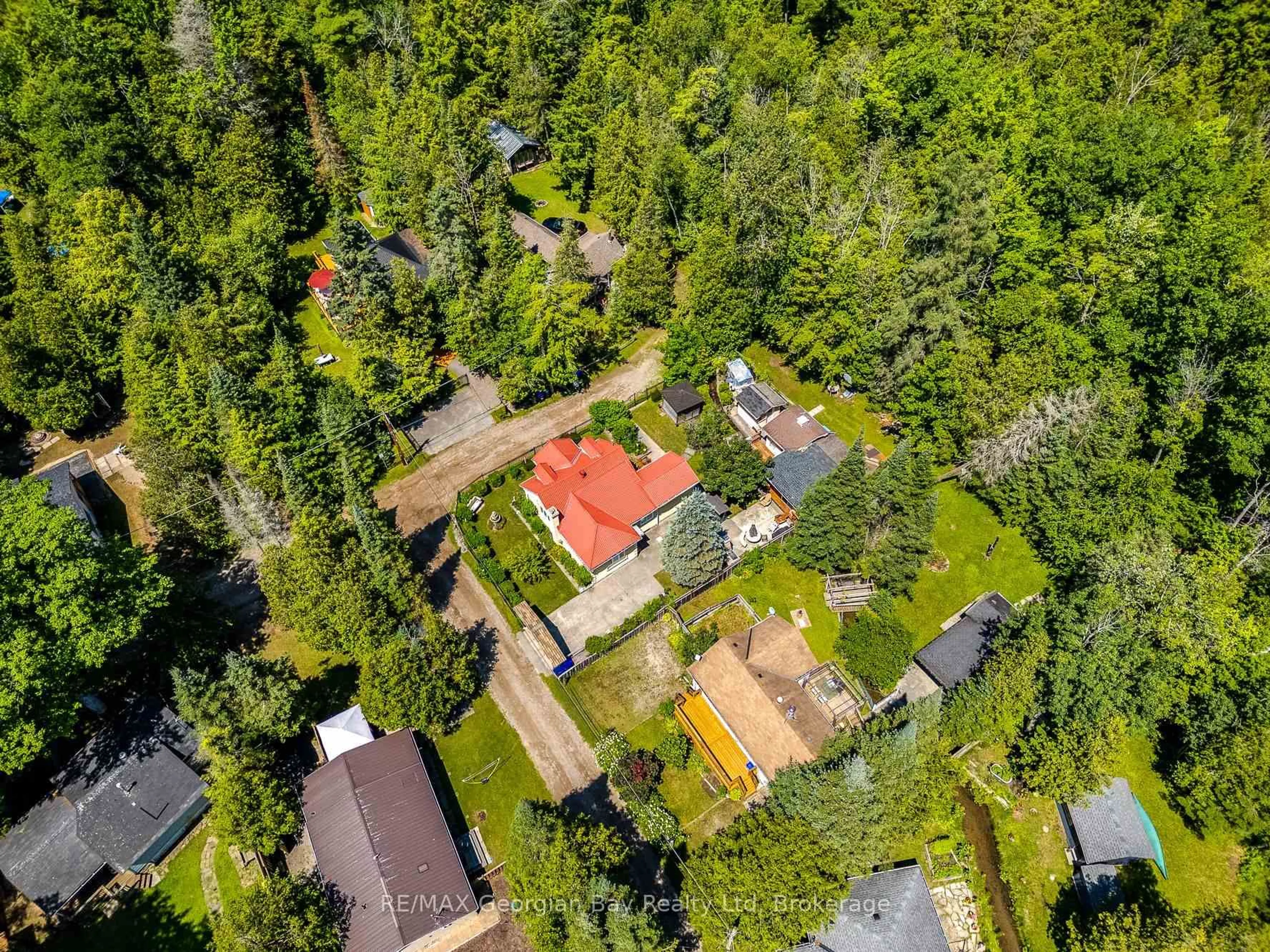 A pic from outside/outdoor area/front of a property/back of a property/a pic from drone, forest/trees view for 3 Brookside Dr, Tiny Ontario L0L 2J0