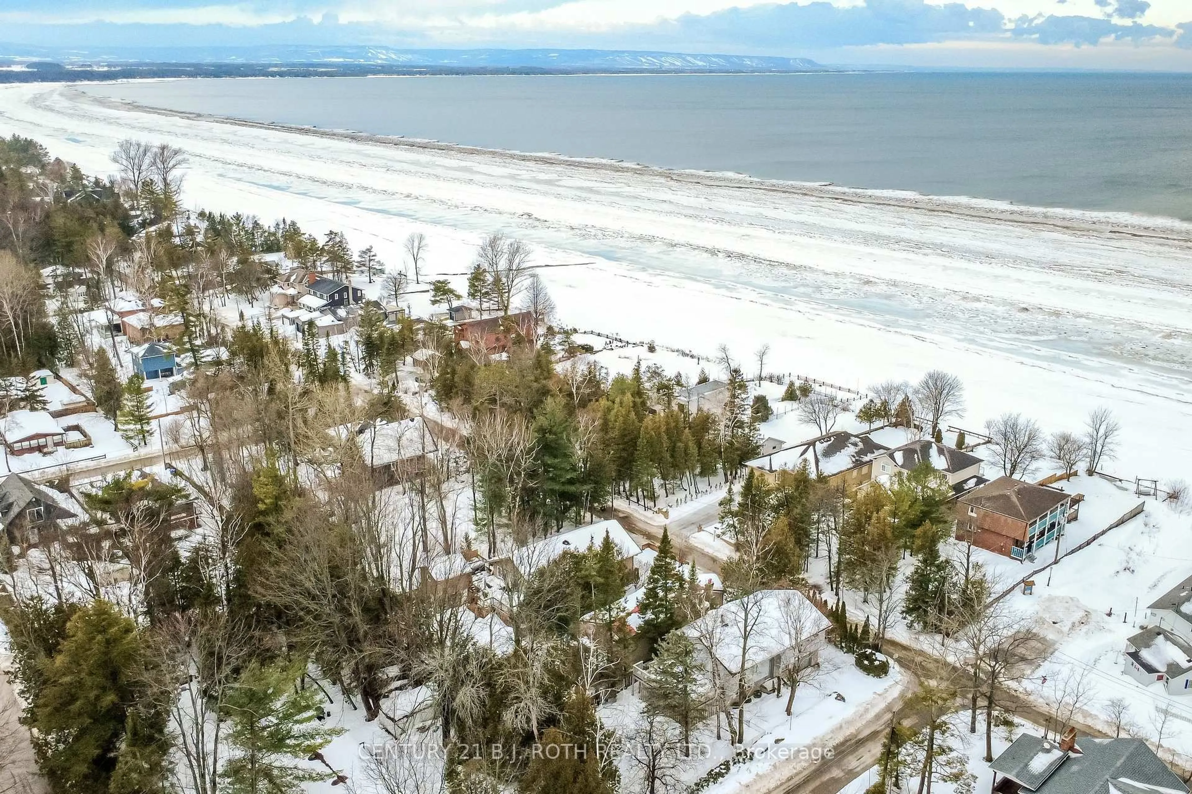 A pic from outside/outdoor area/front of a property/back of a property/a pic from drone, water/lake/river/ocean view for 991 Shore Lane, Wasaga Beach Ontario L9Z 2B4