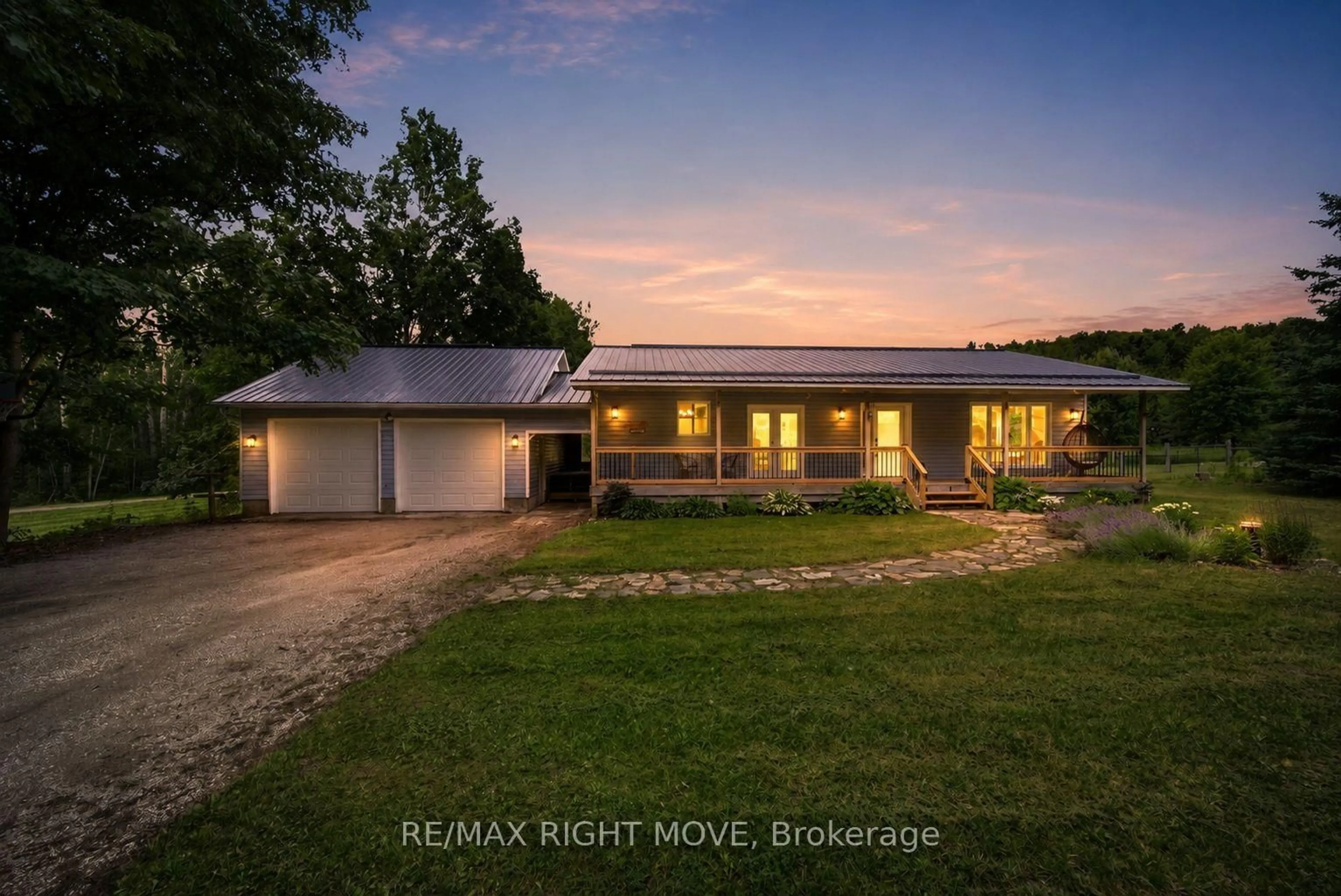 A pic from outside/outdoor area/front of a property/back of a property/a pic from drone, unknown for 4408 12 Line, Oro-Medonte Ontario L0K 1E0