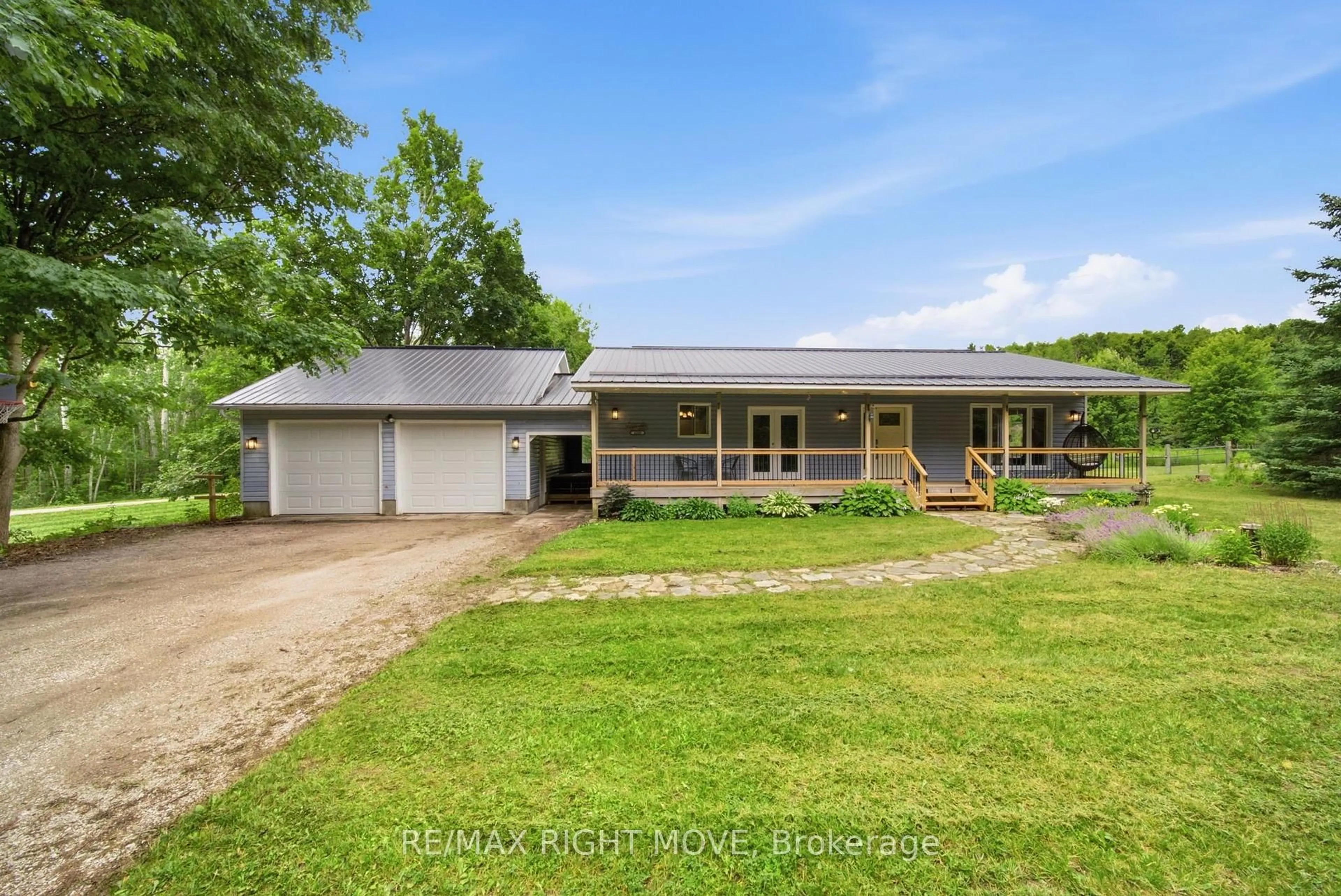 A pic from outside/outdoor area/front of a property/back of a property/a pic from drone, unknown for 4408 12 Line, Oro-Medonte Ontario L0K 1E0