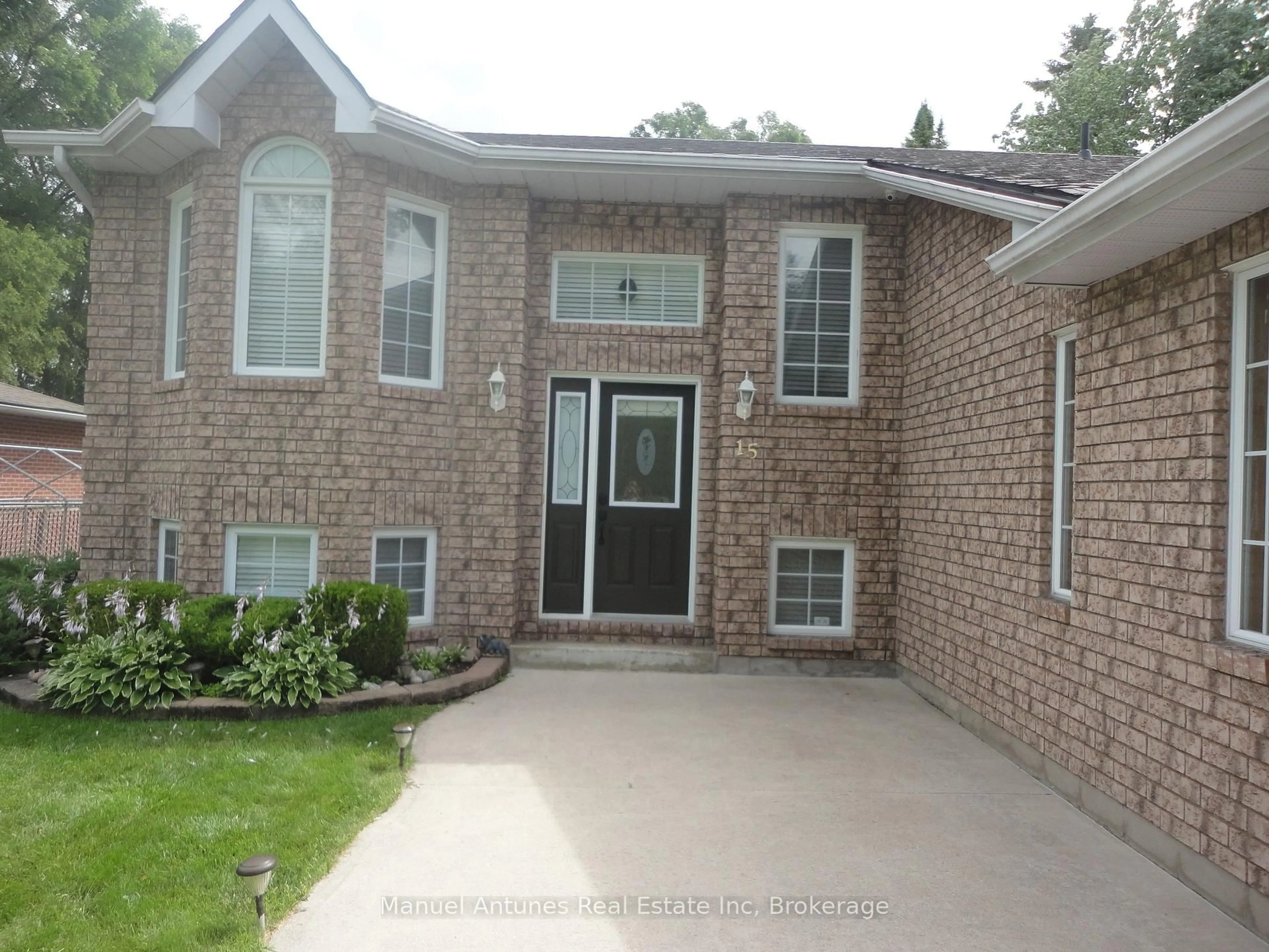 Home with brick exterior material, street for 15 47th St, Wasaga Beach Ontario L9Z 1Y5