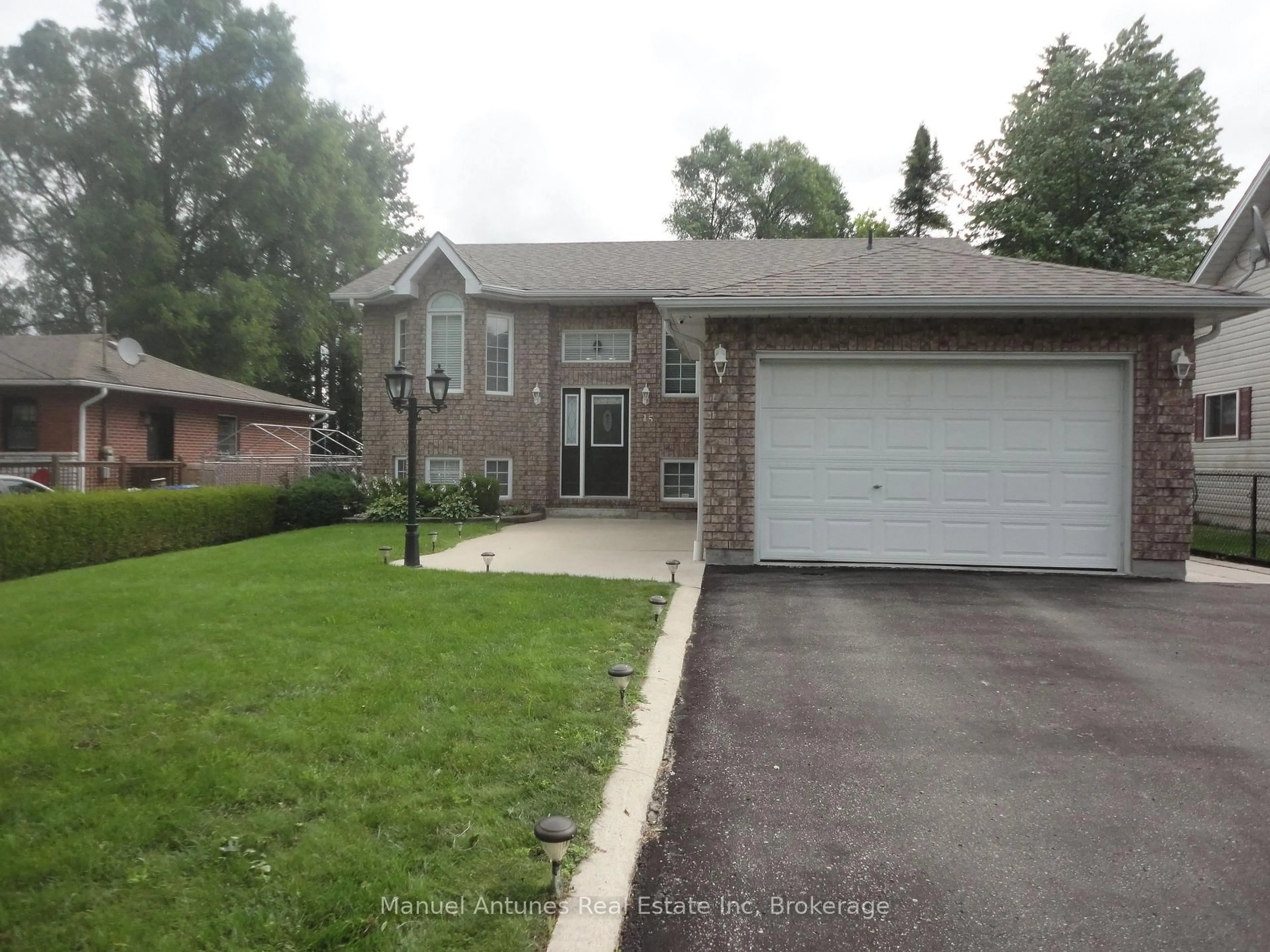 Home with brick exterior material, street for 15 47th St, Wasaga Beach Ontario L9Z 1Y5