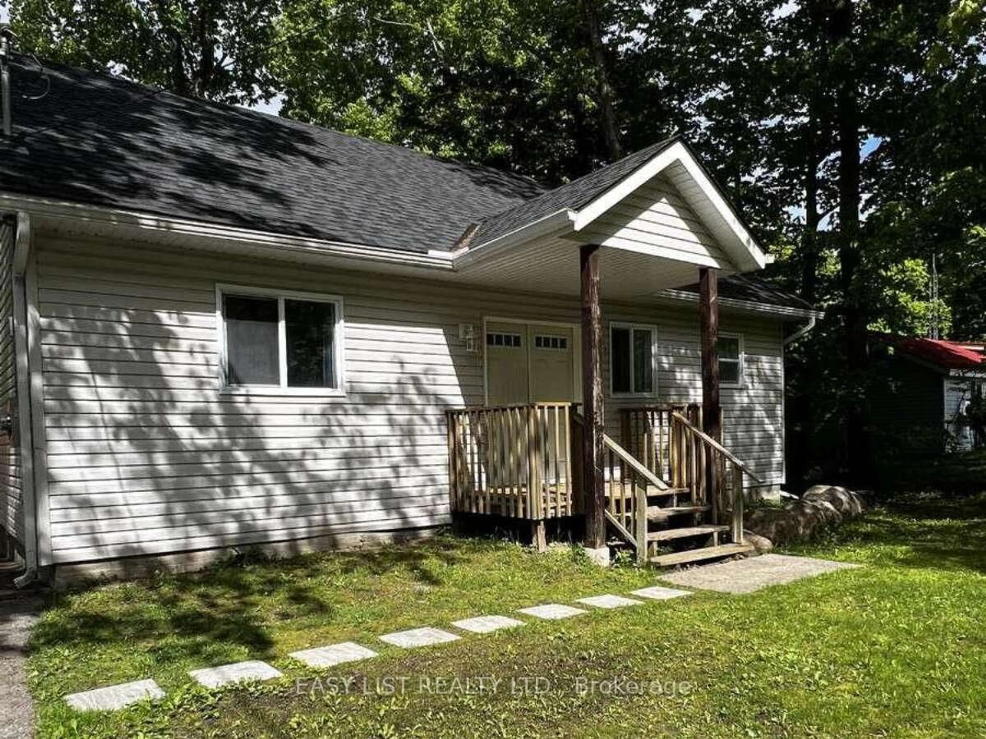 Home with vinyl exterior material, street for 2135 Champlain Rd, Tiny Ontario L9M 0B1