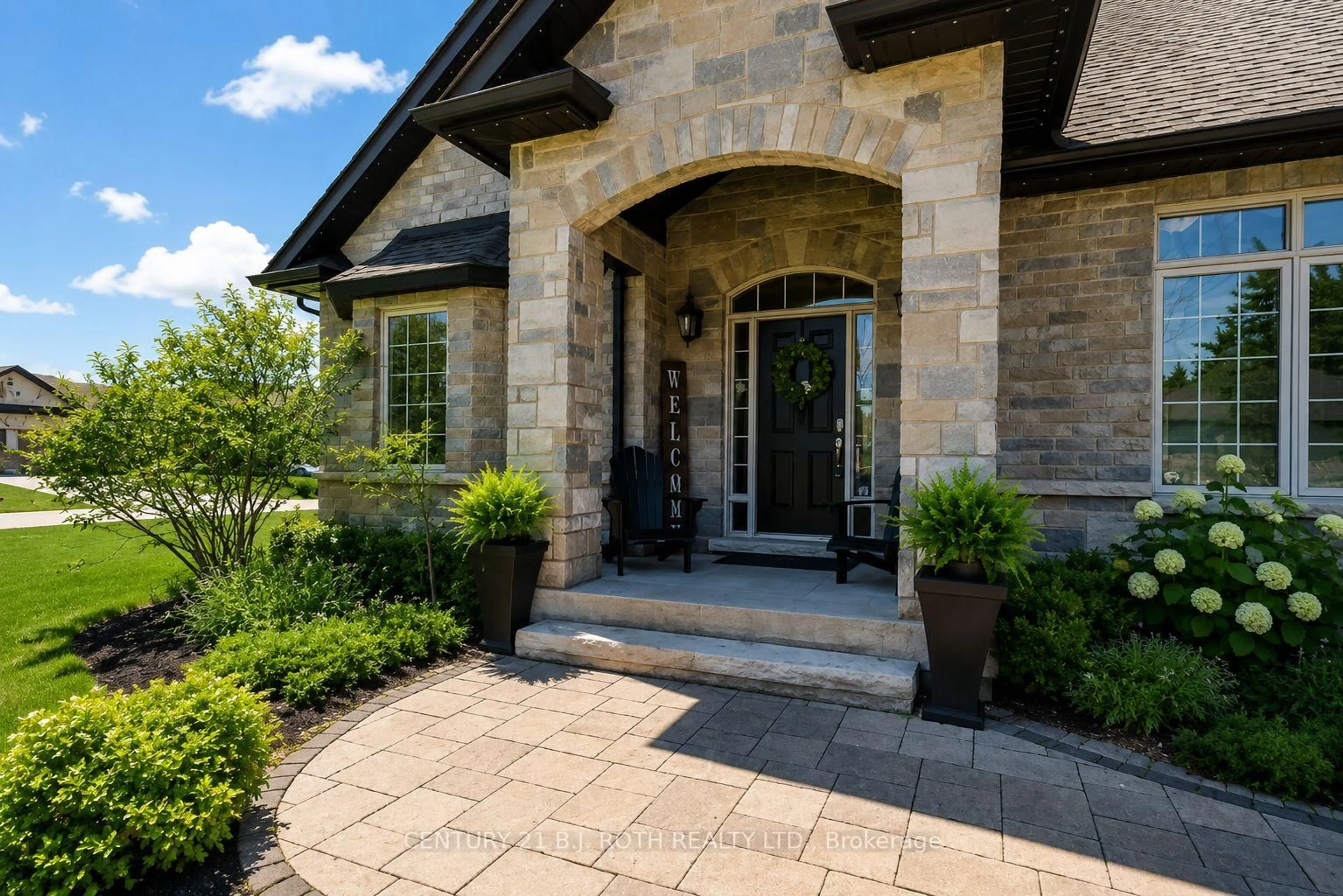 Home with brick exterior material, street for 2 Roy Hickling Dr, Springwater Ontario L9X 0J2