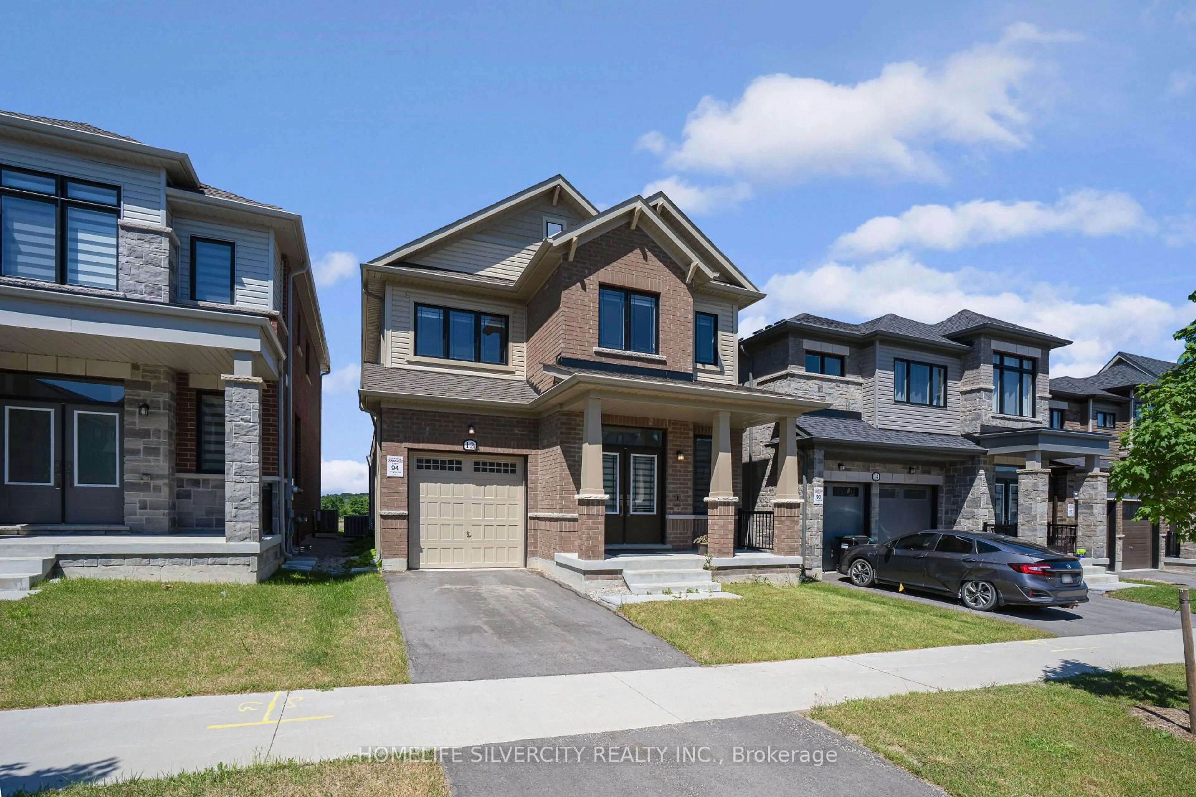 Home with brick exterior material, street for 12 Kingsbury Tr, Barrie Ontario L9J 0W9