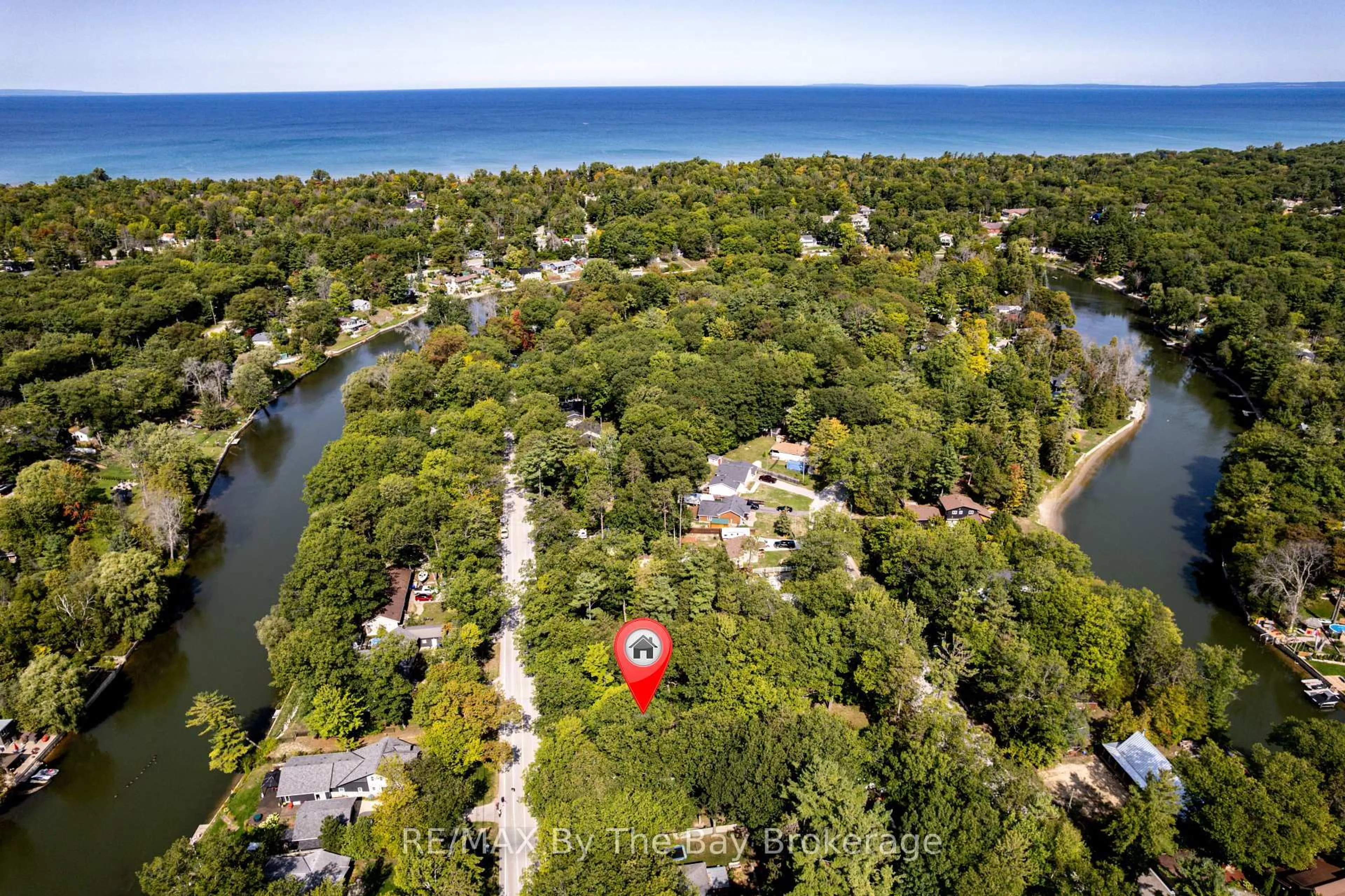 A pic from outside/outdoor area/front of a property/back of a property/a pic from drone, water/lake/river/ocean view for 717 Oxbow Park Dr, Wasaga Beach Ontario L9Z 2V2