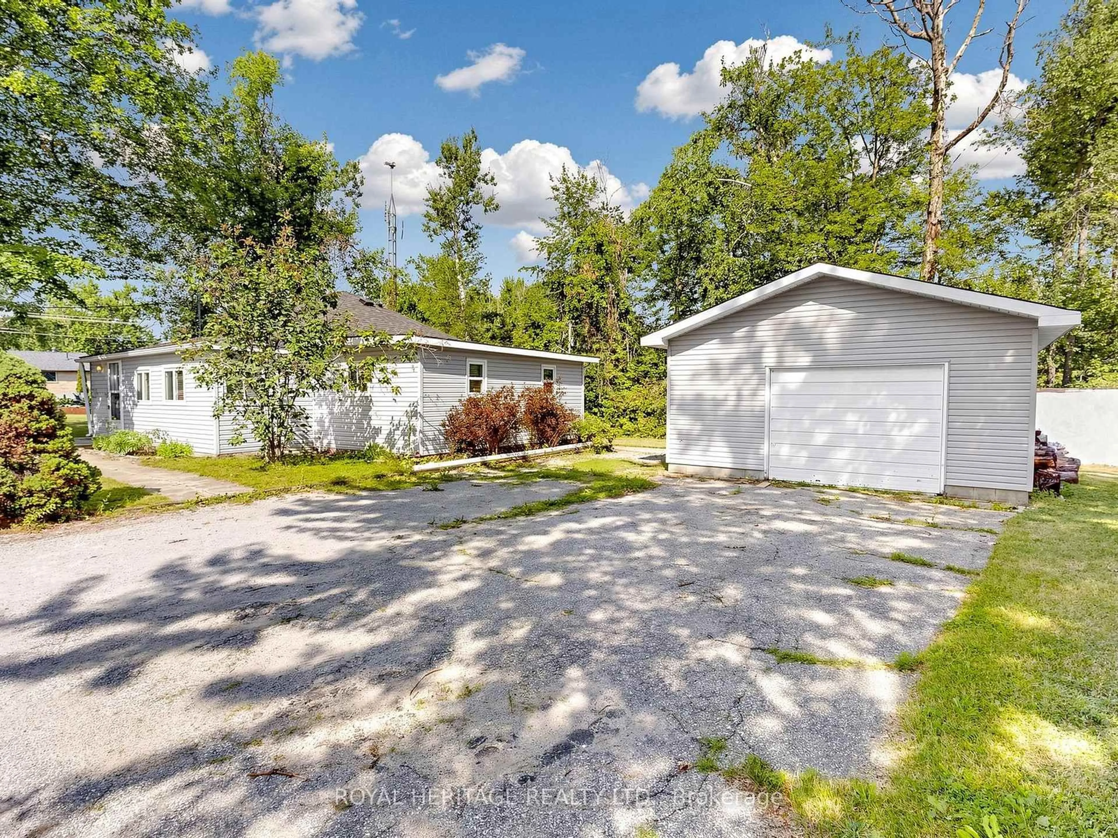 A pic from outside/outdoor area/front of a property/back of a property/a pic from drone, street for 24 Ridge Ave, Ramara Ontario L0K 1B0