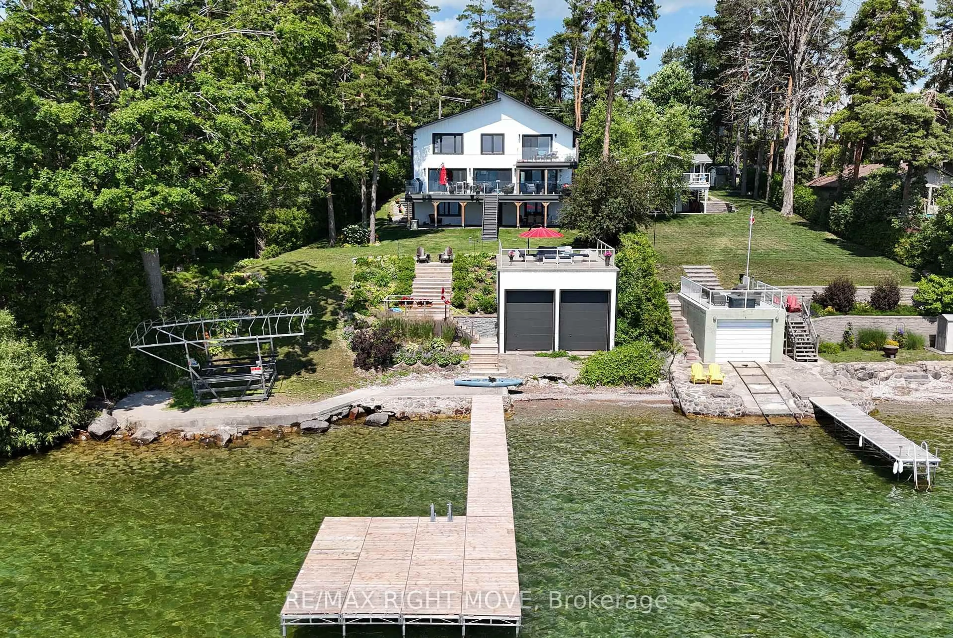 A pic from outside/outdoor area/front of a property/back of a property/a pic from drone, water/lake/river/ocean view for 1189 Woodland Dr, Oro-Medonte Ontario L3V 0R8