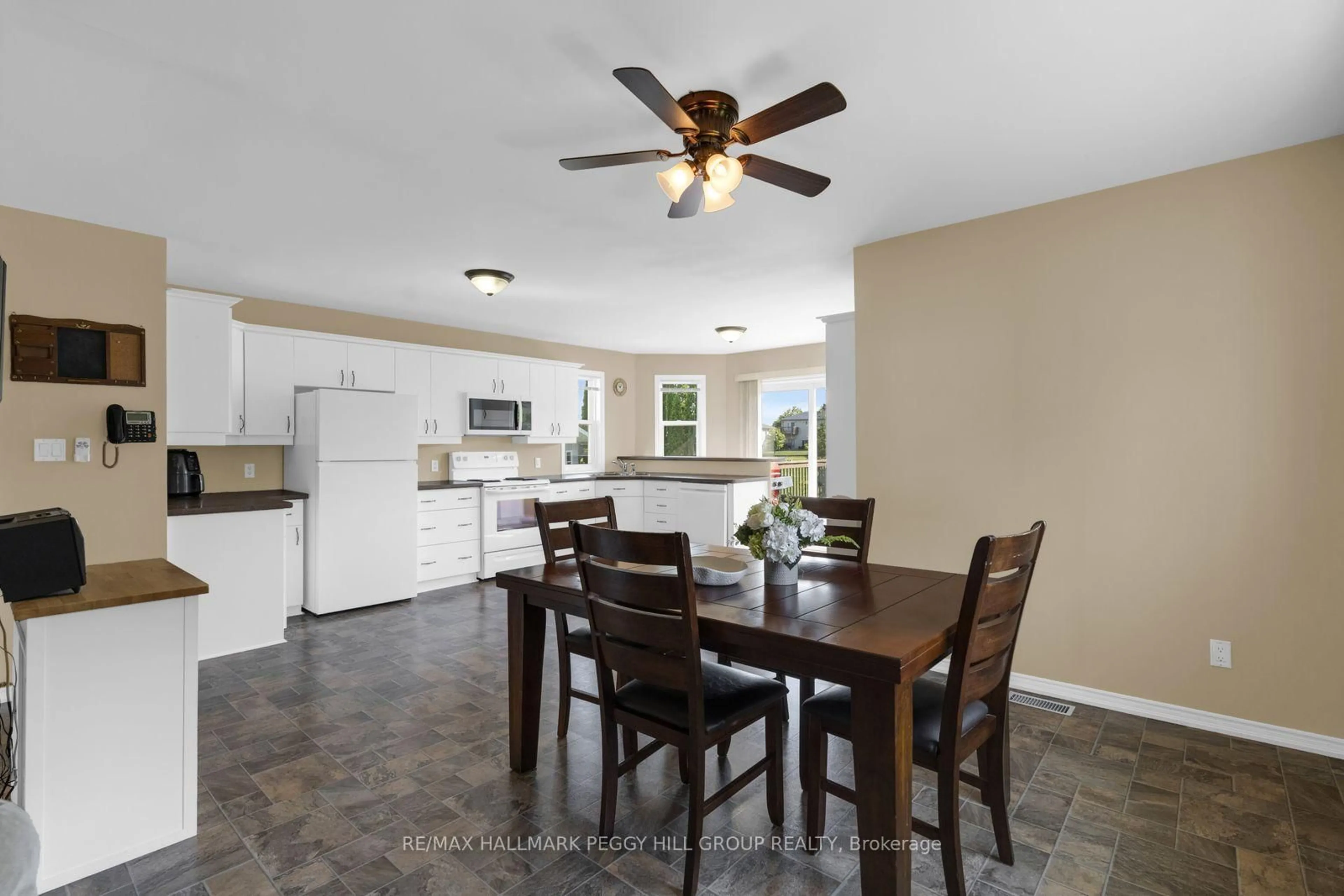 Open concept kitchen, ceramic/tile floor for 5 Allan Crt, Springwater Ontario L0L 1P0