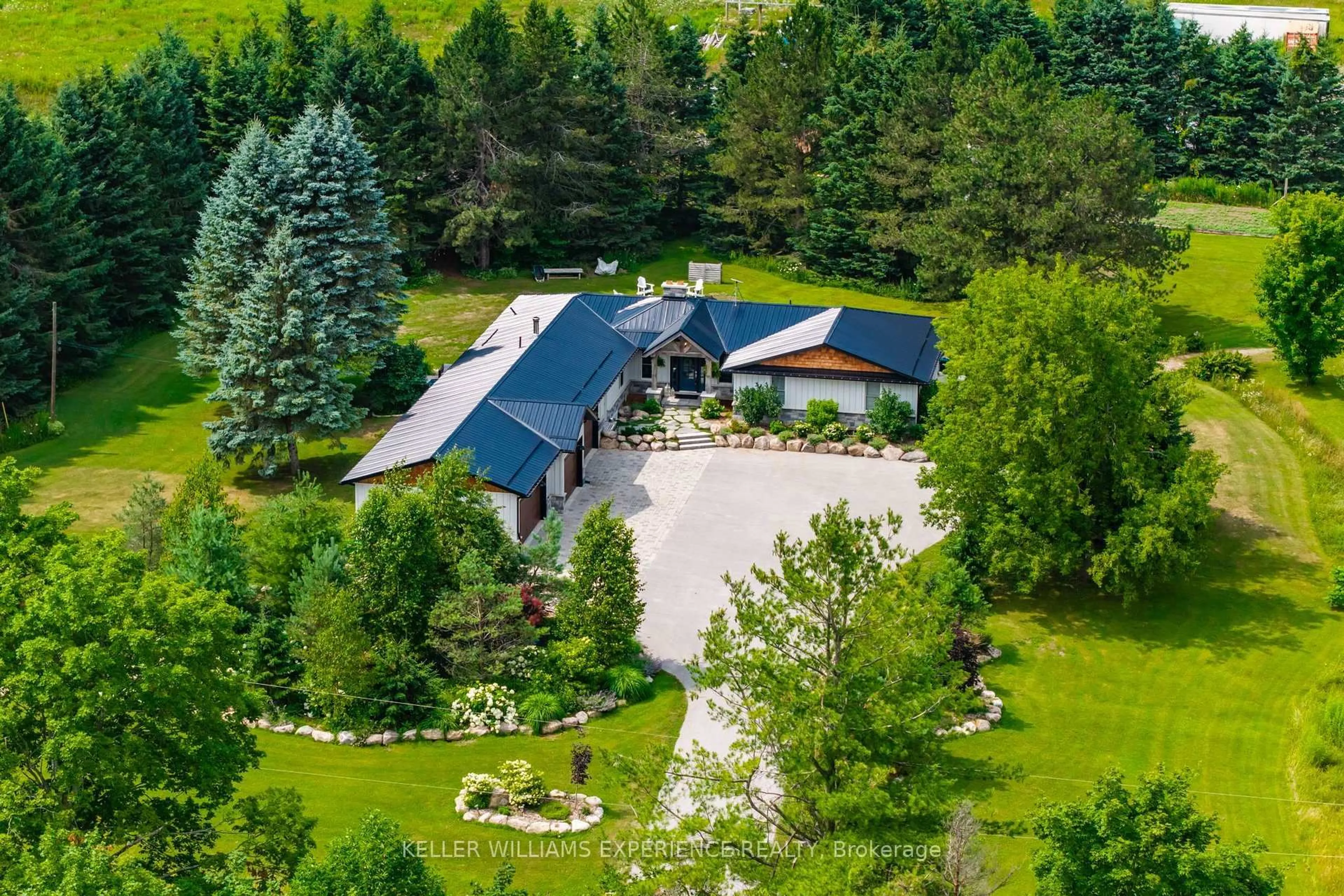 A pic from outside/outdoor area/front of a property/back of a property/a pic from drone, mountain view for 320 6 Concession, Tiny Ontario L0L 2T0