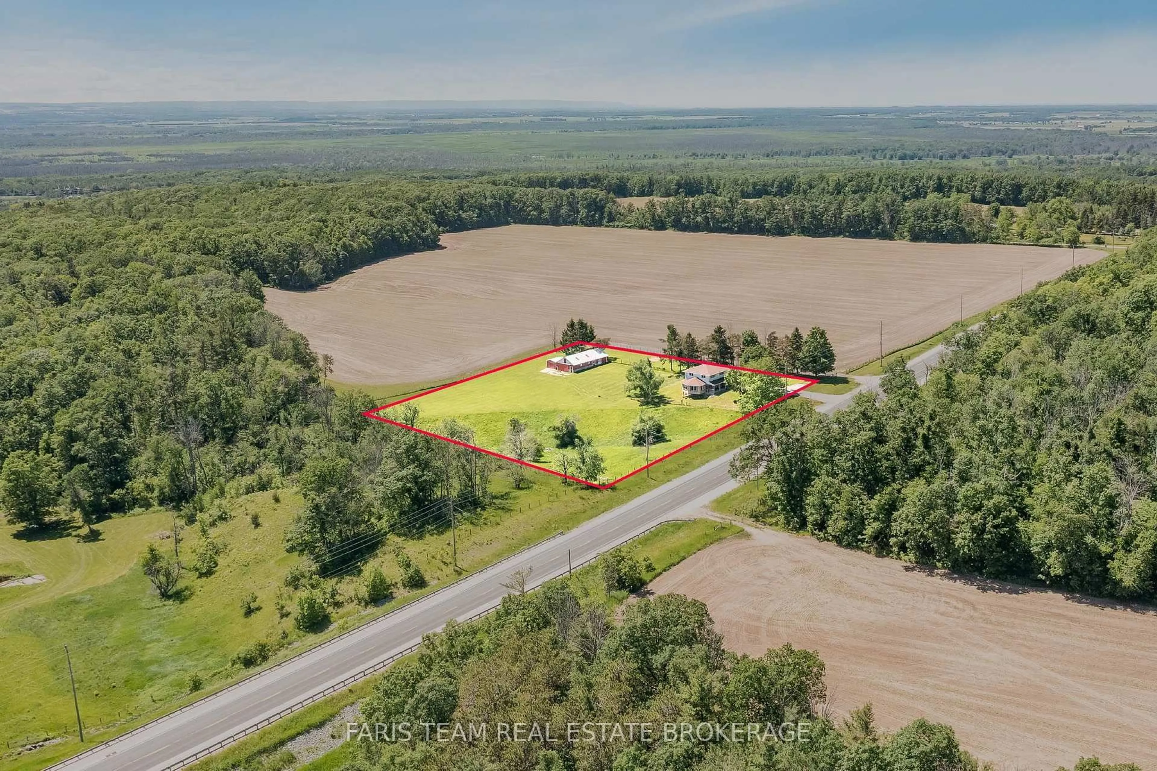 A pic from outside/outdoor area/front of a property/back of a property/a pic from drone, unknown for 2966 George Johnston Rd, Springwater Ontario L9X 1T8