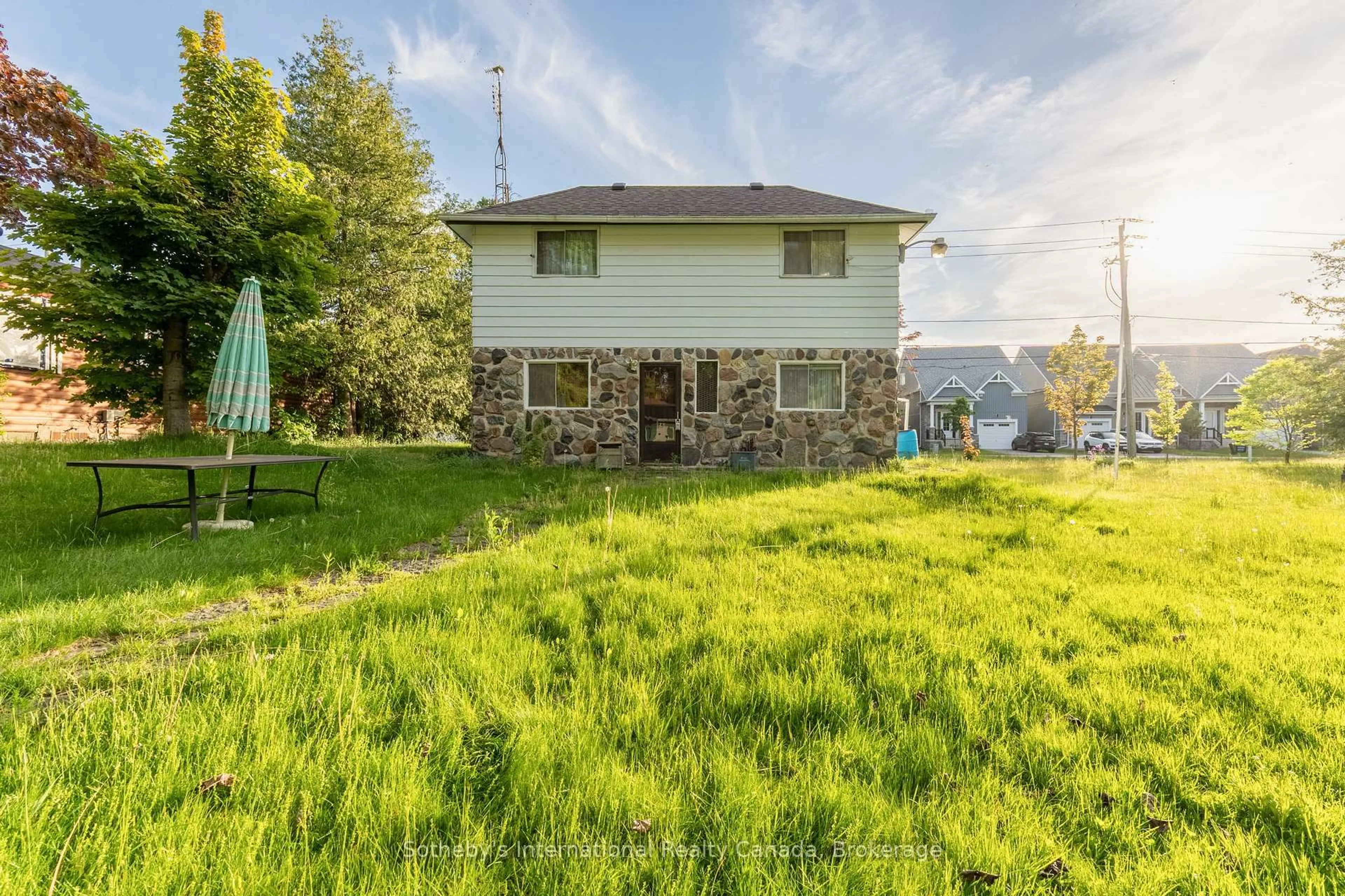 A pic from outside/outdoor area/front of a property/back of a property/a pic from drone, water/lake/river/ocean view for 19 62nd St, Wasaga Beach Ontario L9Z 1V5