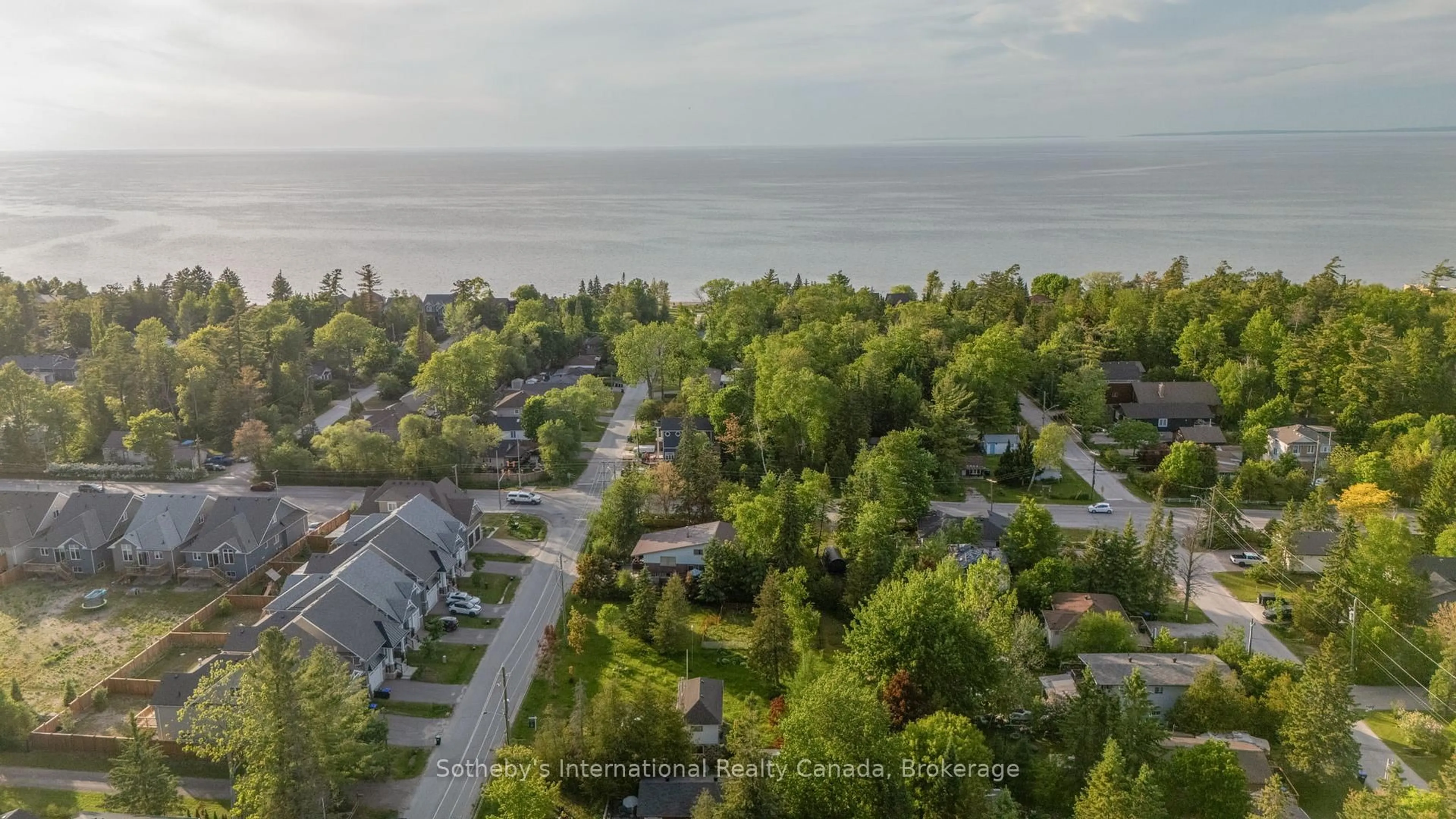 A pic from outside/outdoor area/front of a property/back of a property/a pic from drone, water/lake/river/ocean view for 19 62nd St, Wasaga Beach Ontario L9Z 1V5