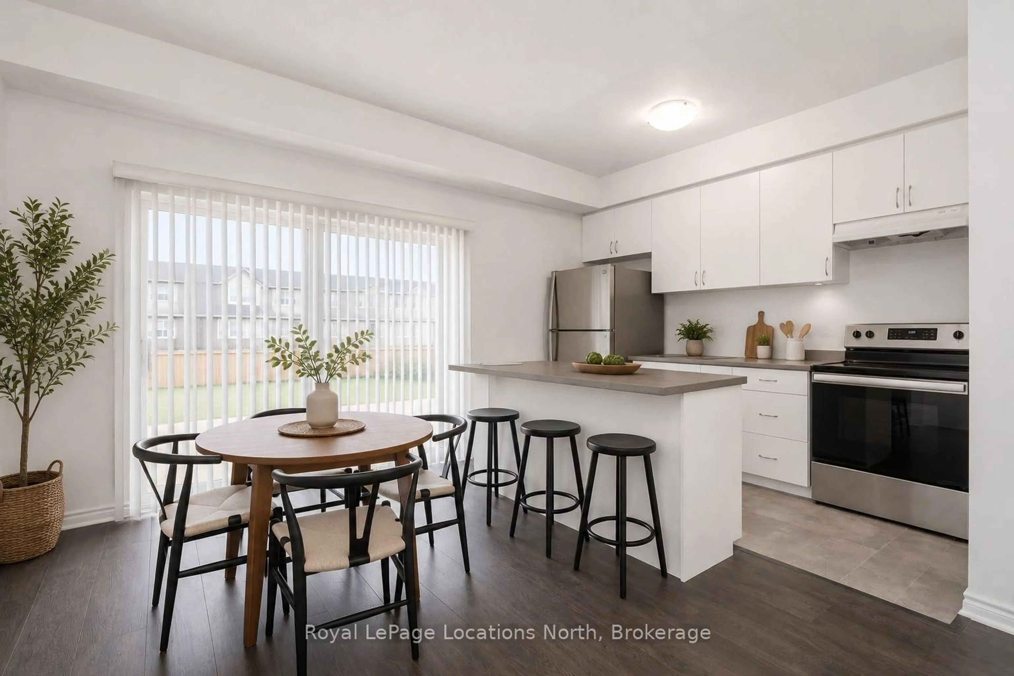 Open concept kitchen, wood/laminate floor for 29 Dunes Dr, Wasaga Beach Ontario L9Z 0J1