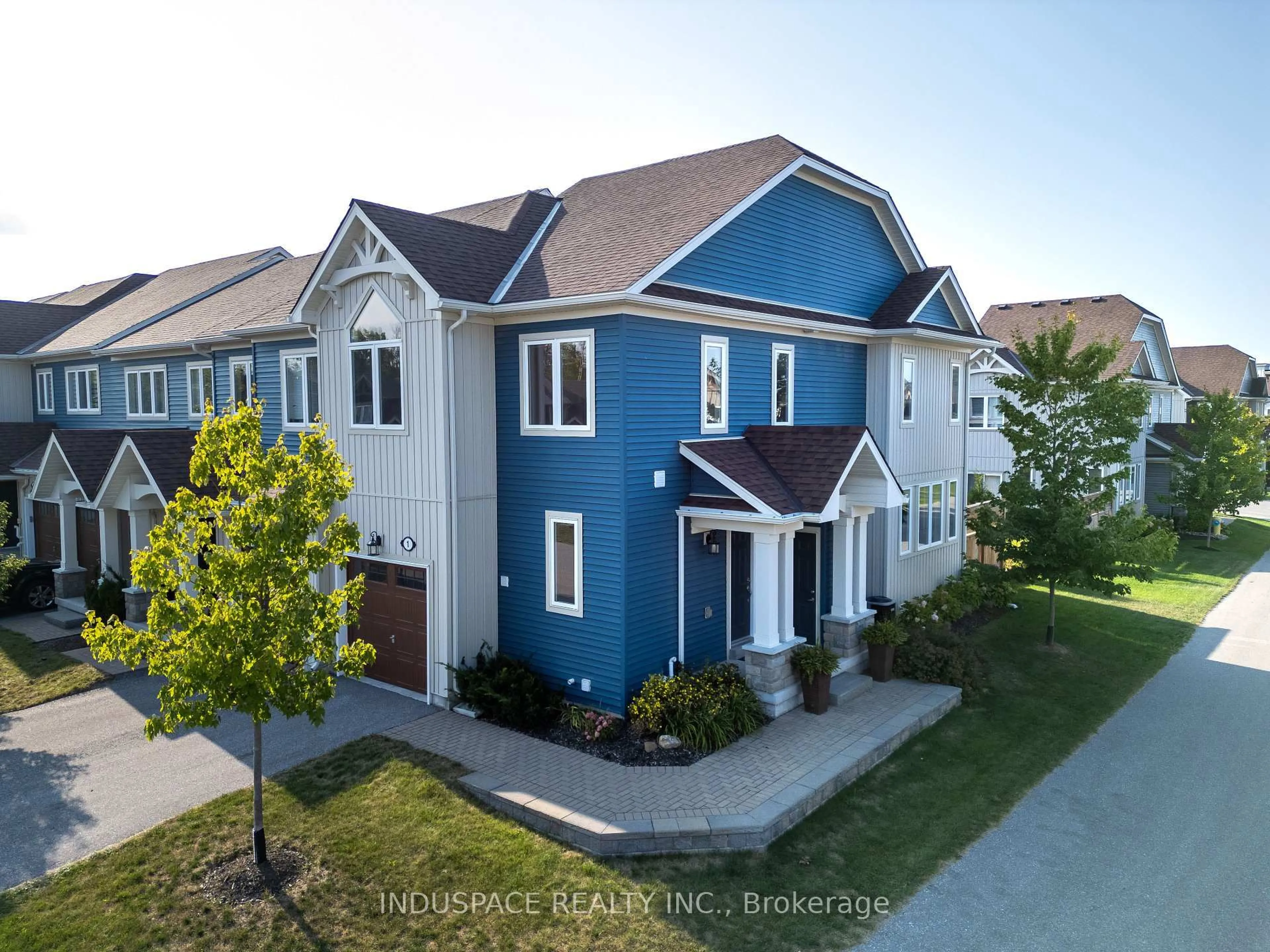 A pic from outside/outdoor area/front of a property/back of a property/a pic from drone, street for 1 Kennedy Ave, Collingwood Ontario L9Y 0Z5