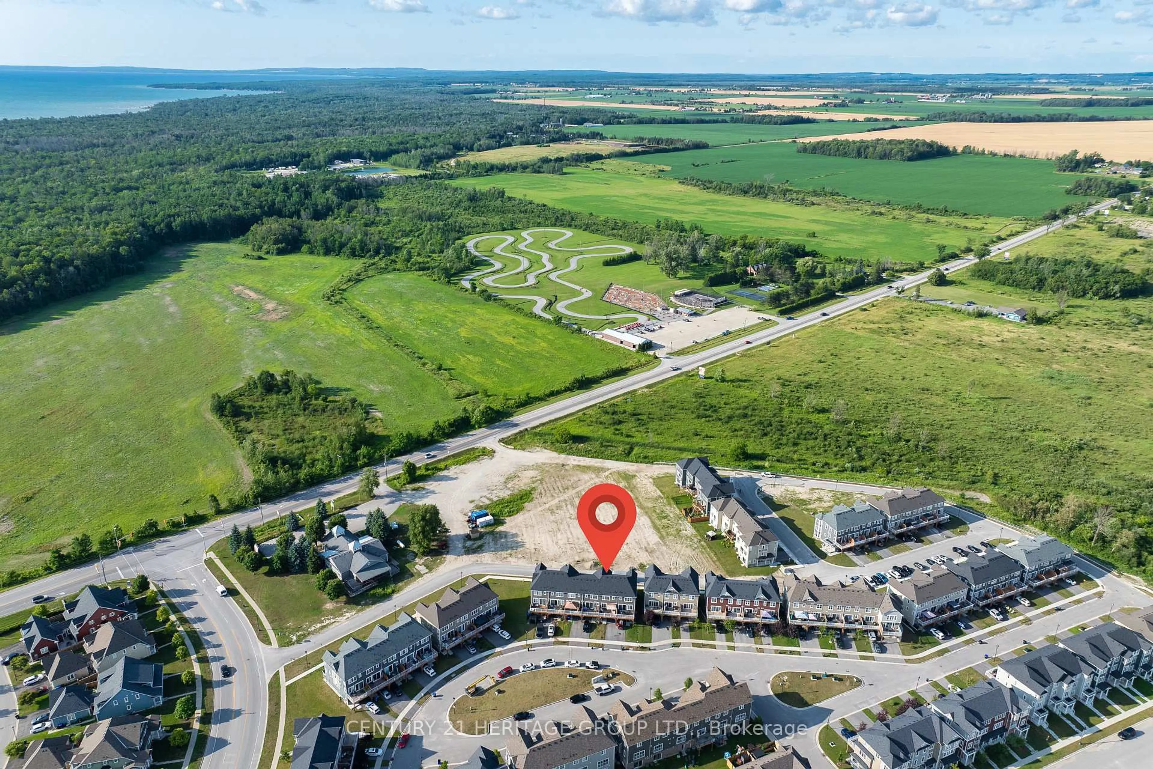 A pic from outside/outdoor area/front of a property/back of a property/a pic from drone, water/lake/river/ocean view for 57 Surf Dr, Wasaga Beach Ontario L9Z 0J4