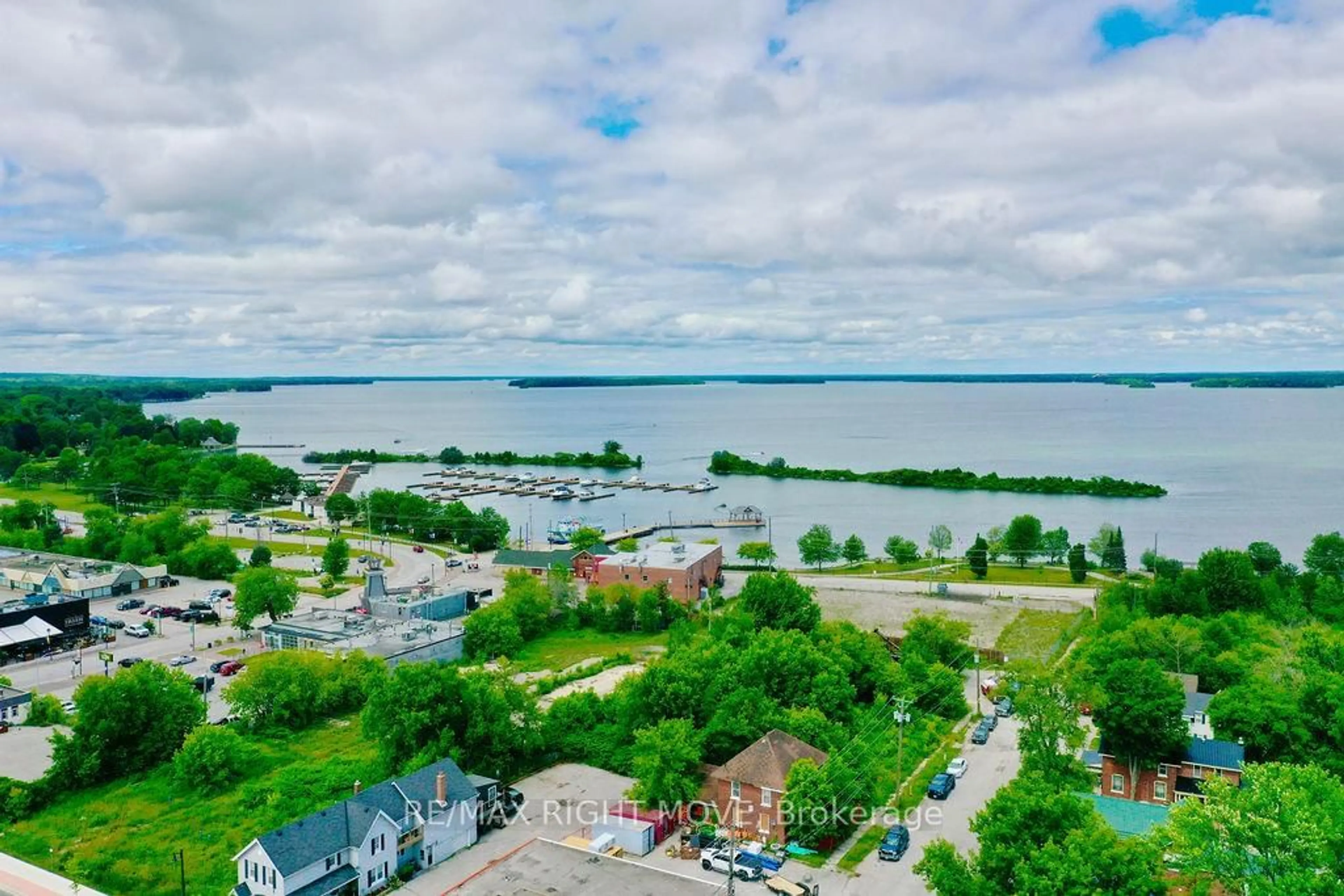 A pic from outside/outdoor area/front of a property/back of a property/a pic from drone, water/lake/river/ocean view for 21 Matchedash St #403L, Orillia Ontario L3V 4W4
