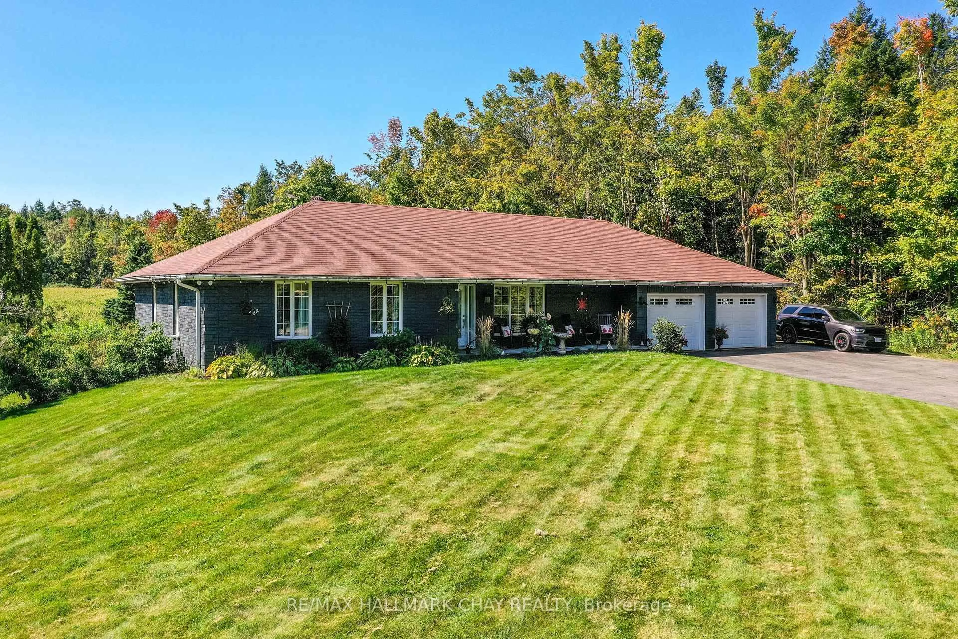 A pic from outside/outdoor area/front of a property/back of a property/a pic from drone, water/lake/river/ocean view for 1440 2 Line, Oro-Medonte Ontario L0L 2L0