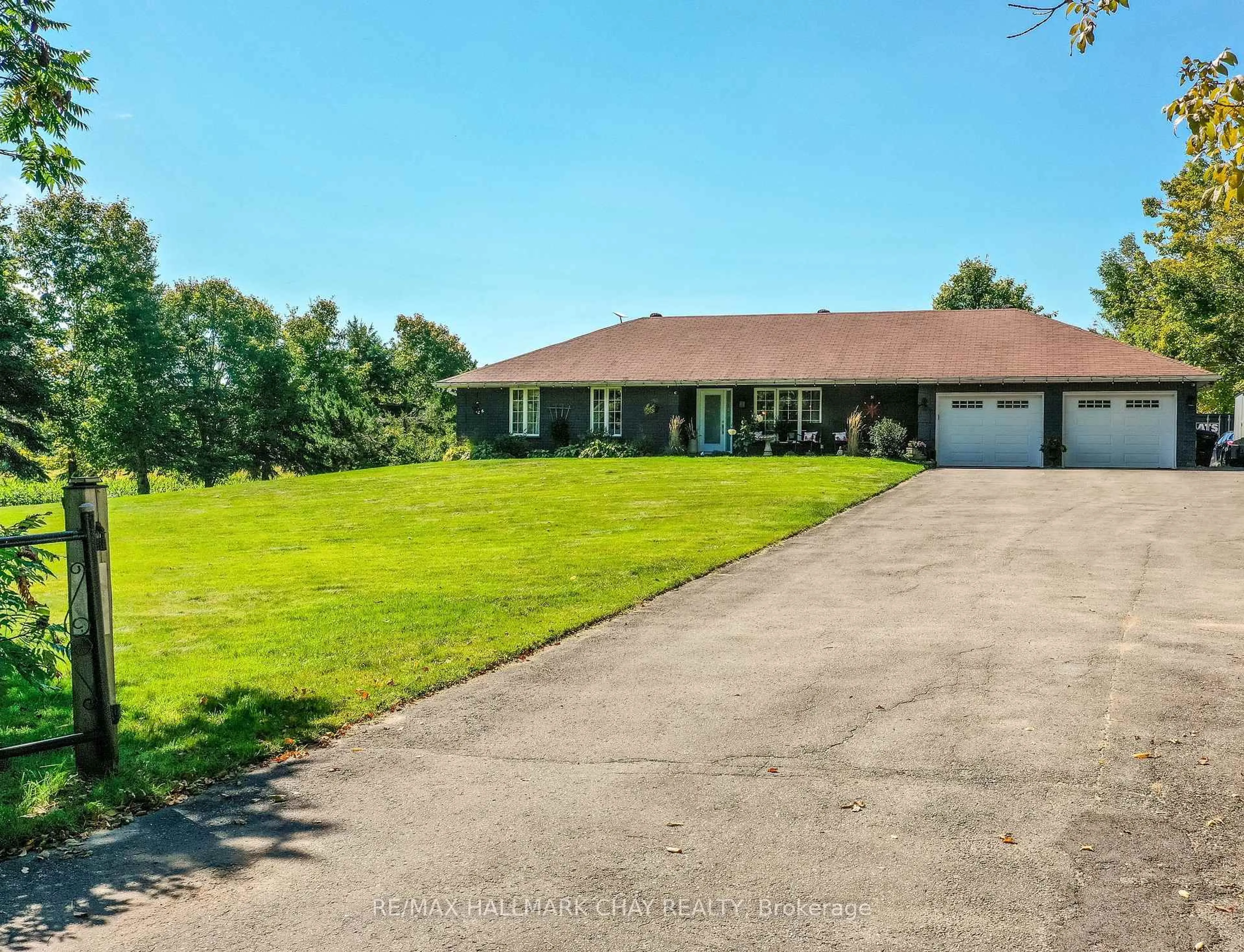 A pic from outside/outdoor area/front of a property/back of a property/a pic from drone, water/lake/river/ocean view for 1440 2 Line, Oro-Medonte Ontario L0L 2L0