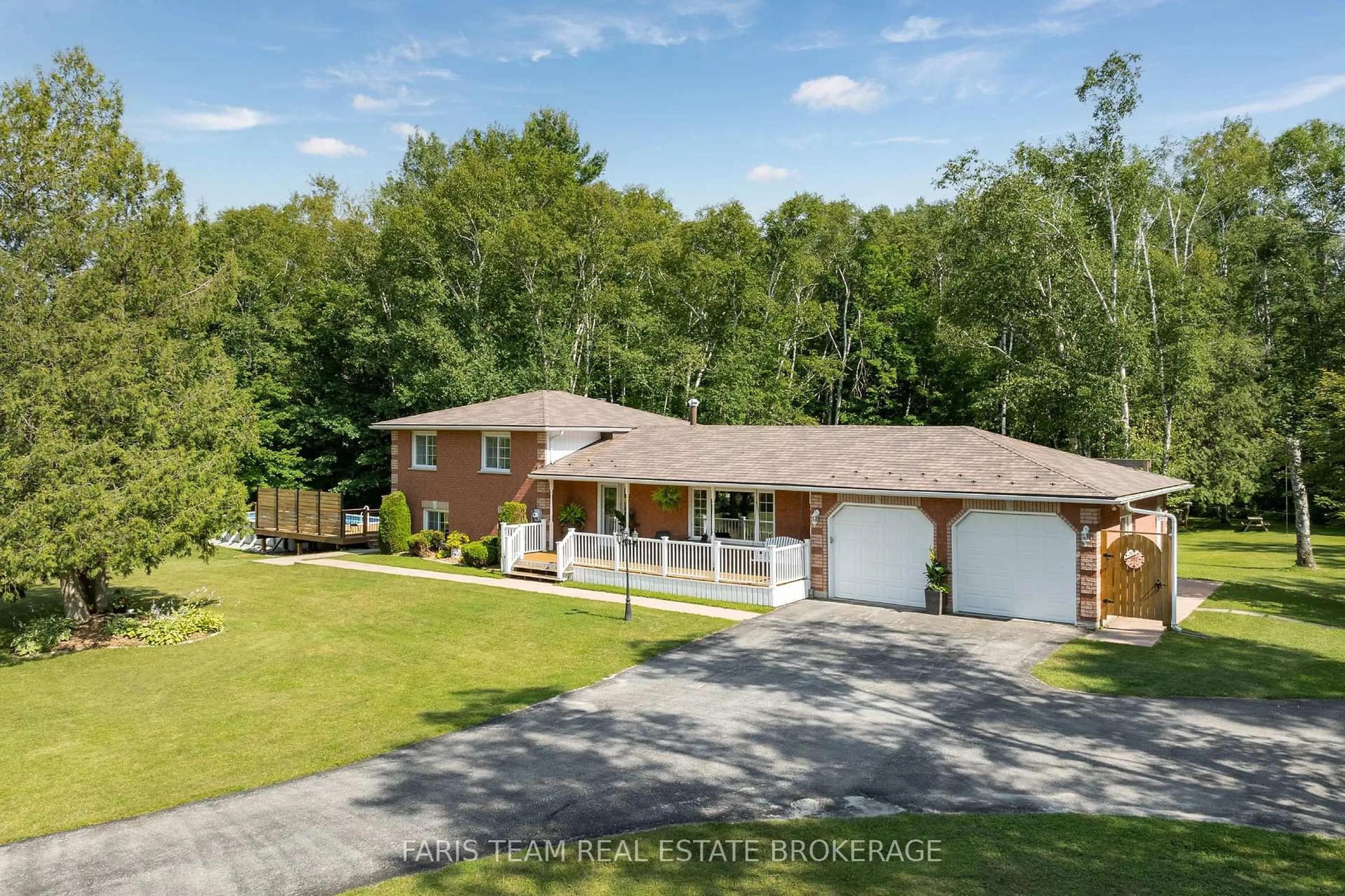 A pic from outside/outdoor area/front of a property/back of a property/a pic from drone, unknown for 1765 Flos Road 4, Springwater Ontario L0L 2K0