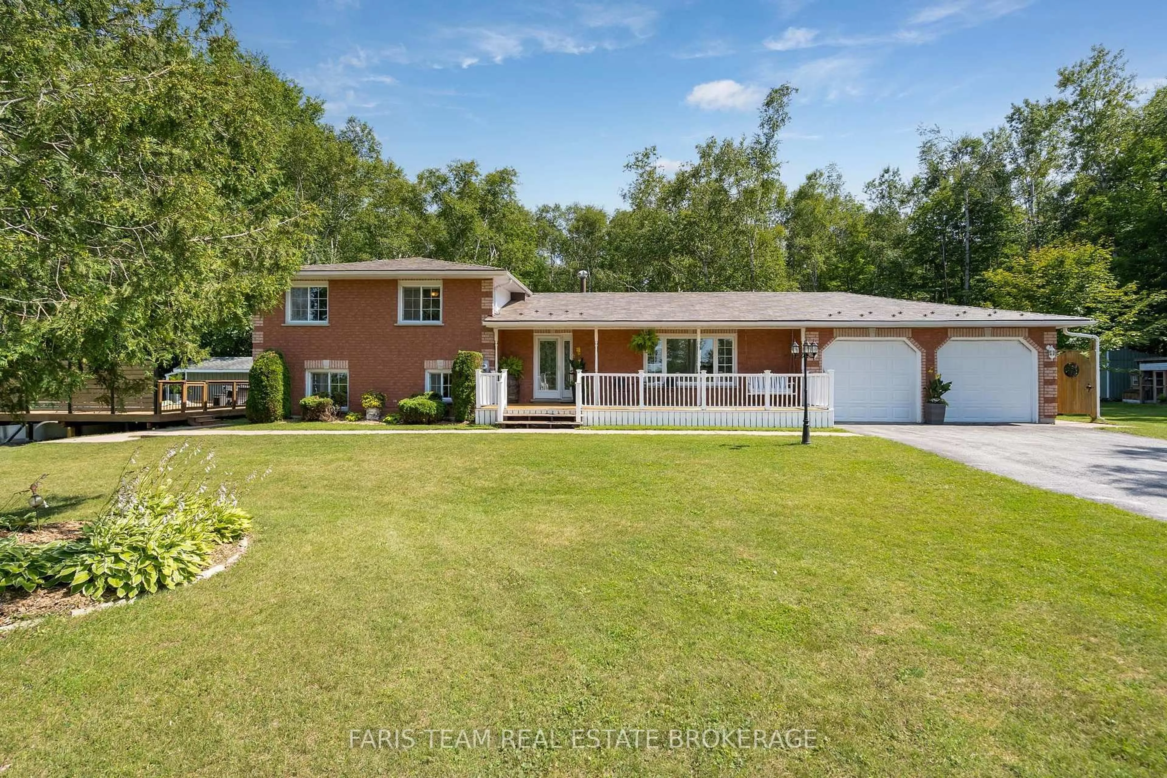 A pic from outside/outdoor area/front of a property/back of a property/a pic from drone, water/lake/river/ocean view for 1765 Flos Road 4, Springwater Ontario L0L 2K0