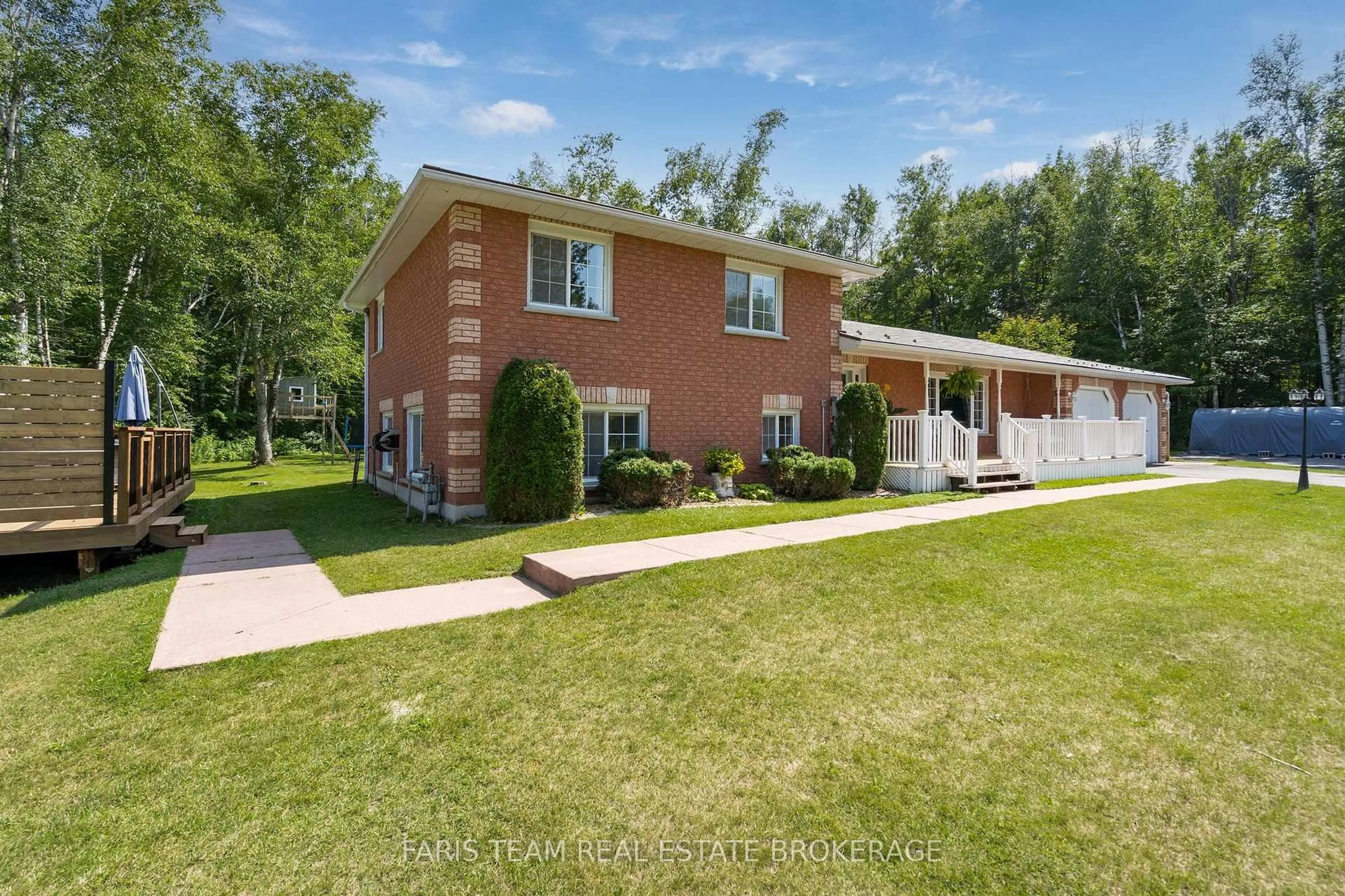 A pic from outside/outdoor area/front of a property/back of a property/a pic from drone, unknown for 1765 Flos Road 4, Springwater Ontario L0L 2K0