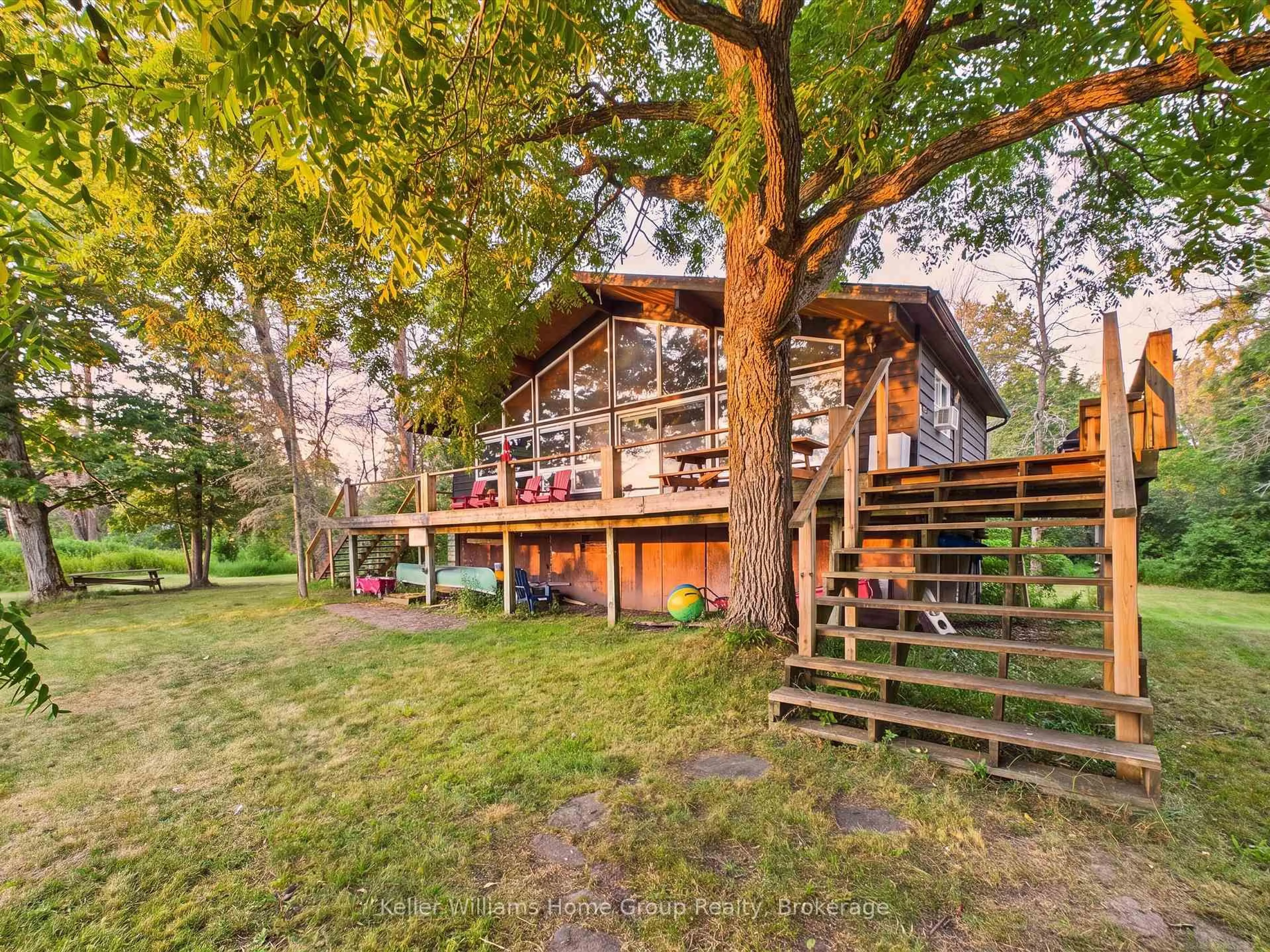 A pic from outside/outdoor area/front of a property/back of a property/a pic from drone, forest/trees view for 10 & 11 Methodist Island, Tay Ontario L0K 1R0