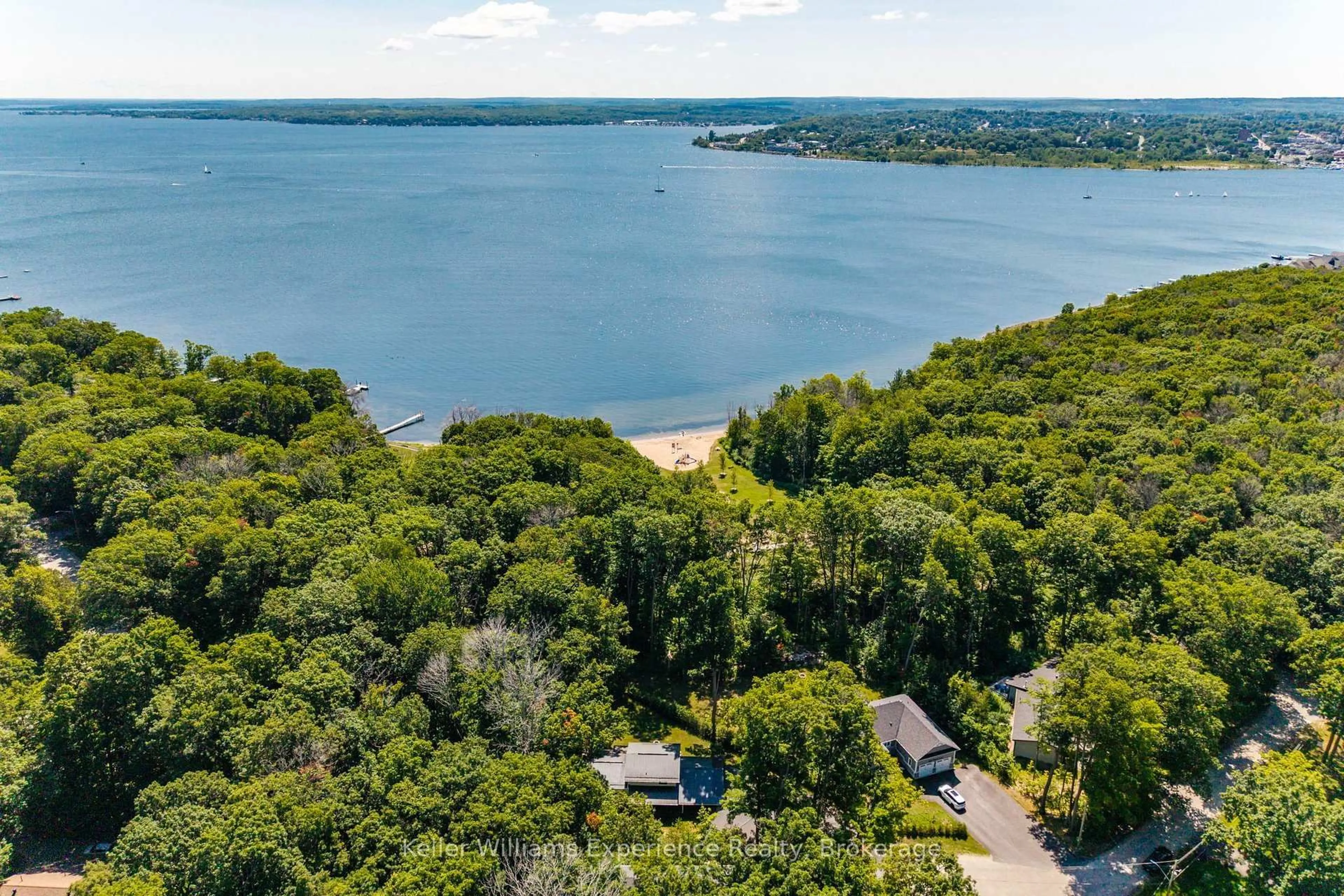 A pic from outside/outdoor area/front of a property/back of a property/a pic from drone, water/lake/river/ocean view for 469 Parkview Crt, Midland Ontario L4R 5G3