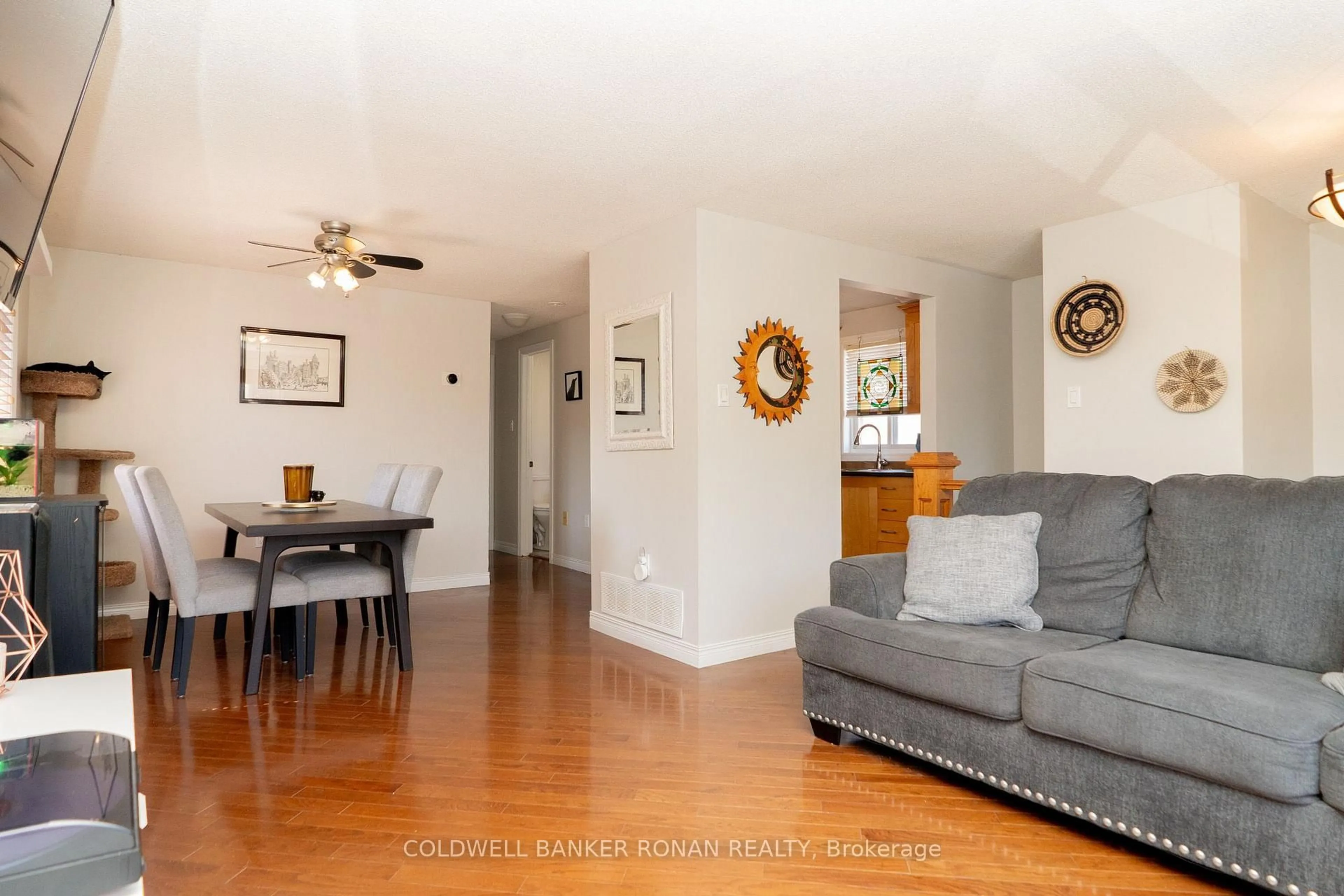 Living room with furniture, wood/laminate floor for 37 Ferguson Dr, Barrie Ontario L4N 7B4