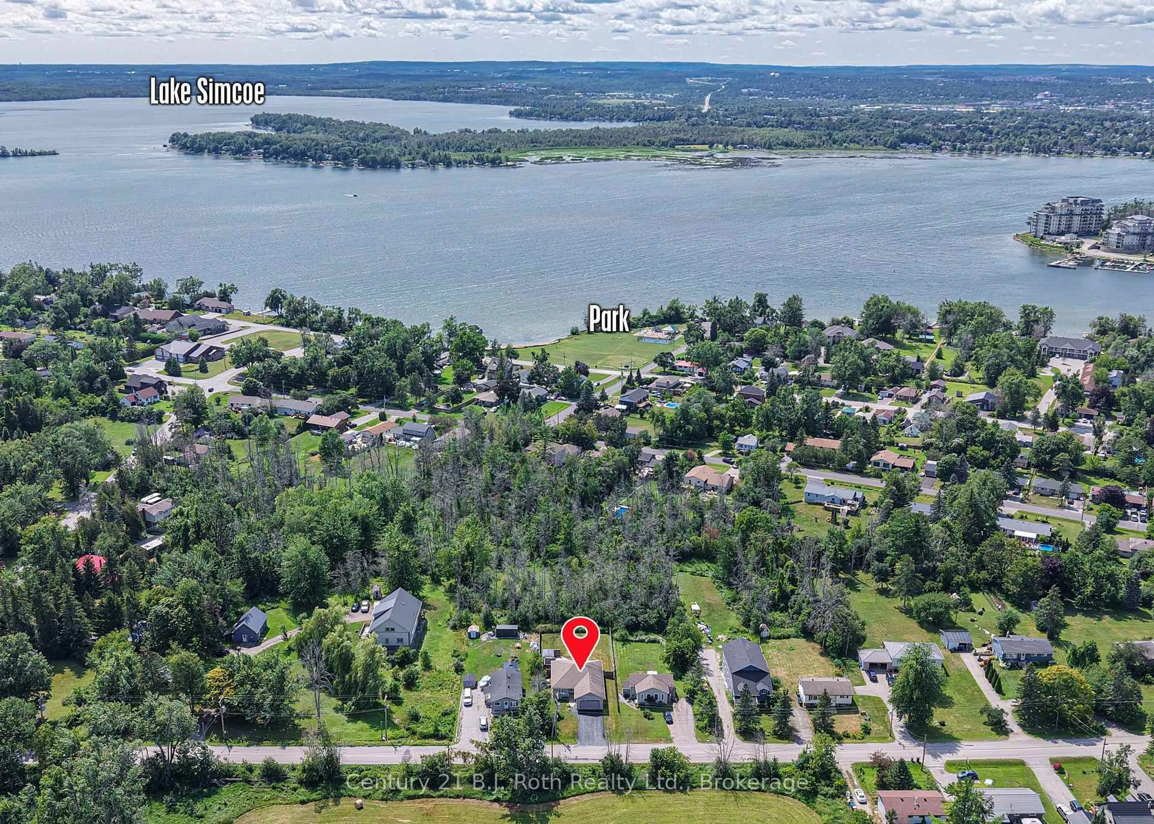A pic from outside/outdoor area/front of a property/back of a property/a pic from drone, water/lake/river/ocean view for 65 Courtland St, Ramara Ontario L3V 1A6