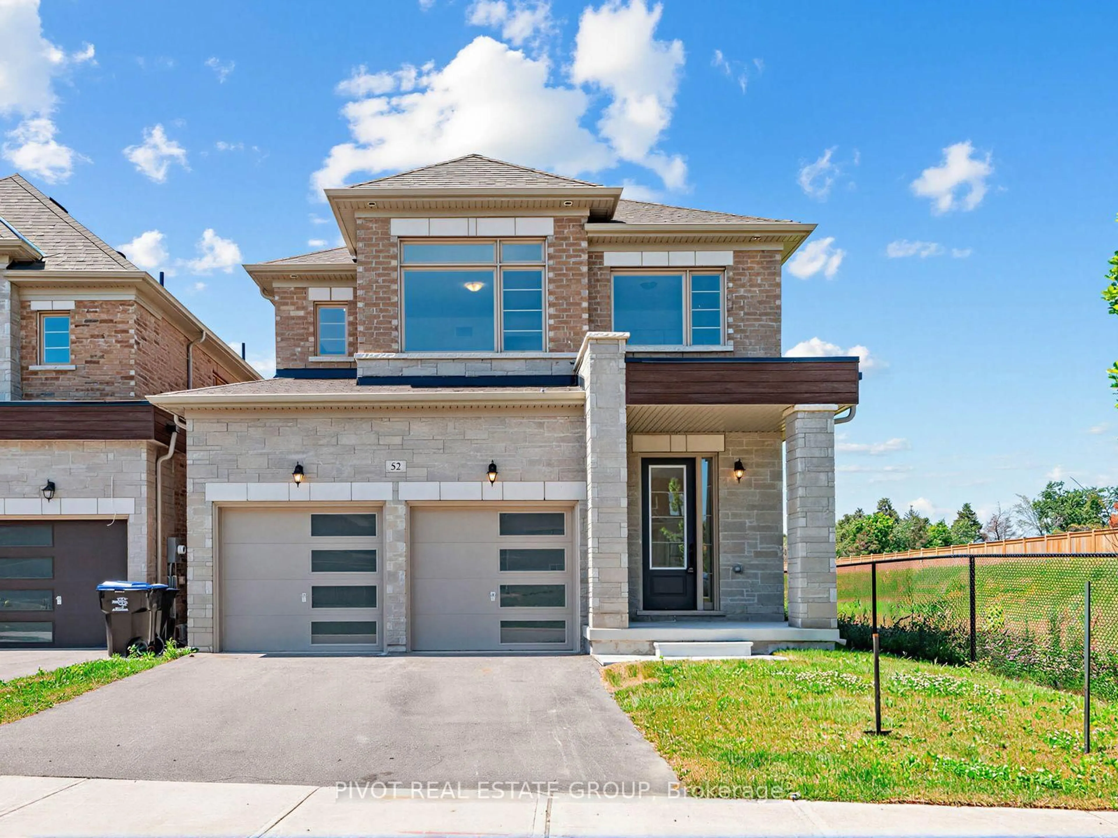 Home with brick exterior material, street for 52 Calypso Ave, Springwater Ontario L9X 2C5
