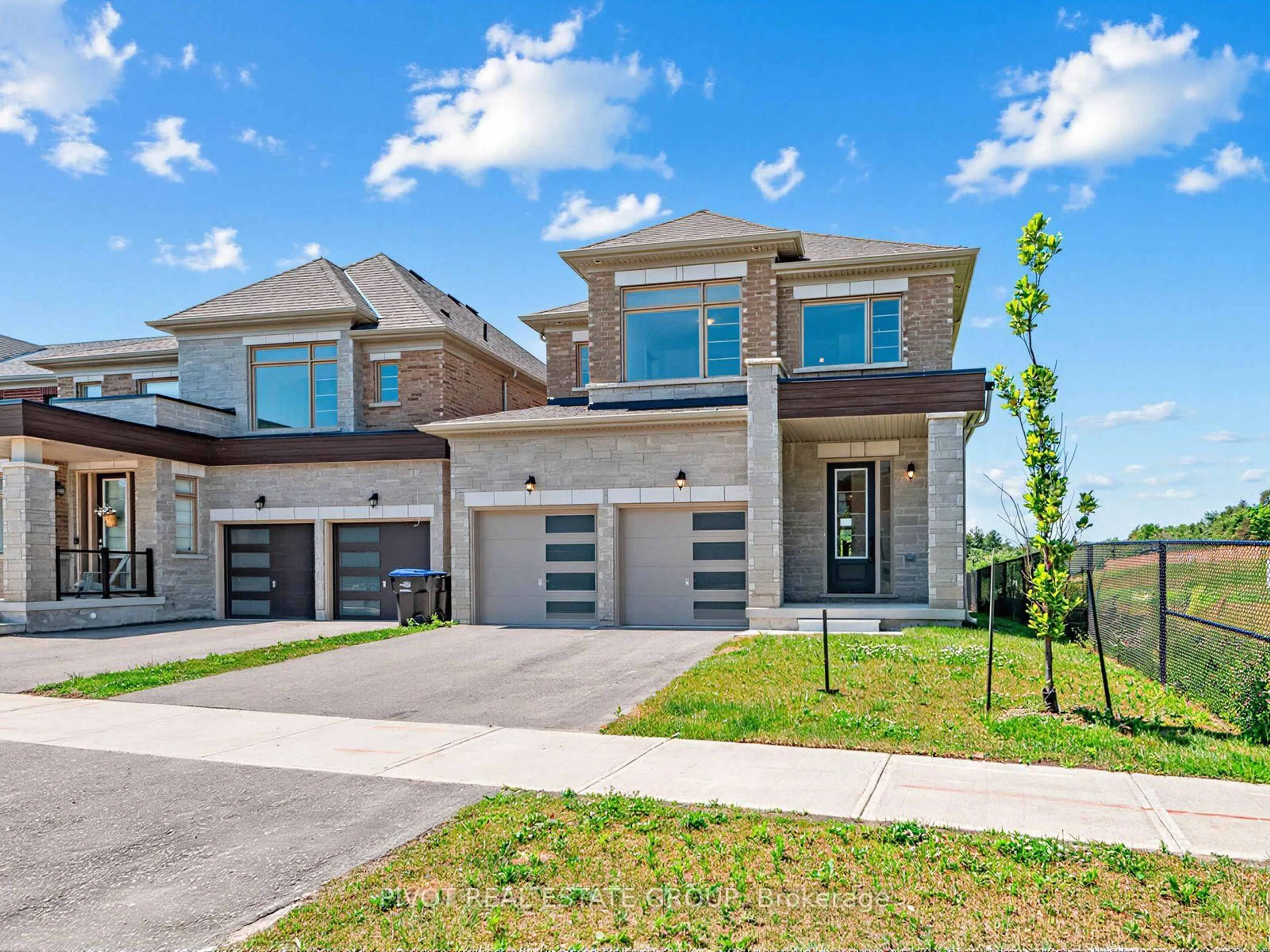Home with brick exterior material, street for 52 Calypso Ave, Springwater Ontario L9X 2C5