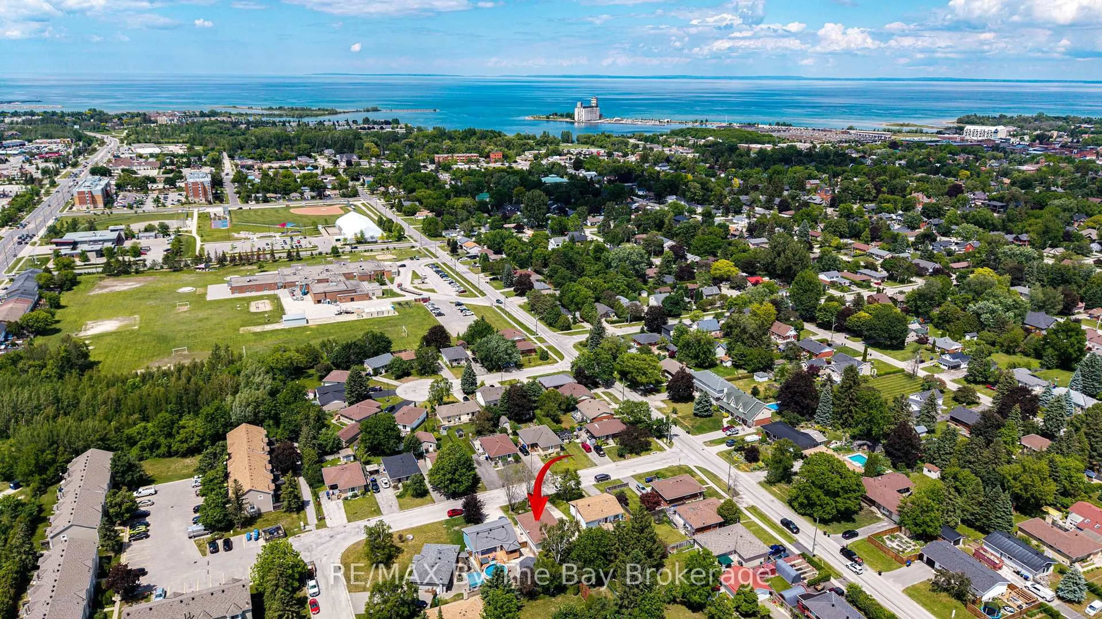 A pic from outside/outdoor area/front of a property/back of a property/a pic from drone, water/lake/river/ocean view for 4 Watts Cres, Collingwood Ontario L9Y 4H2
