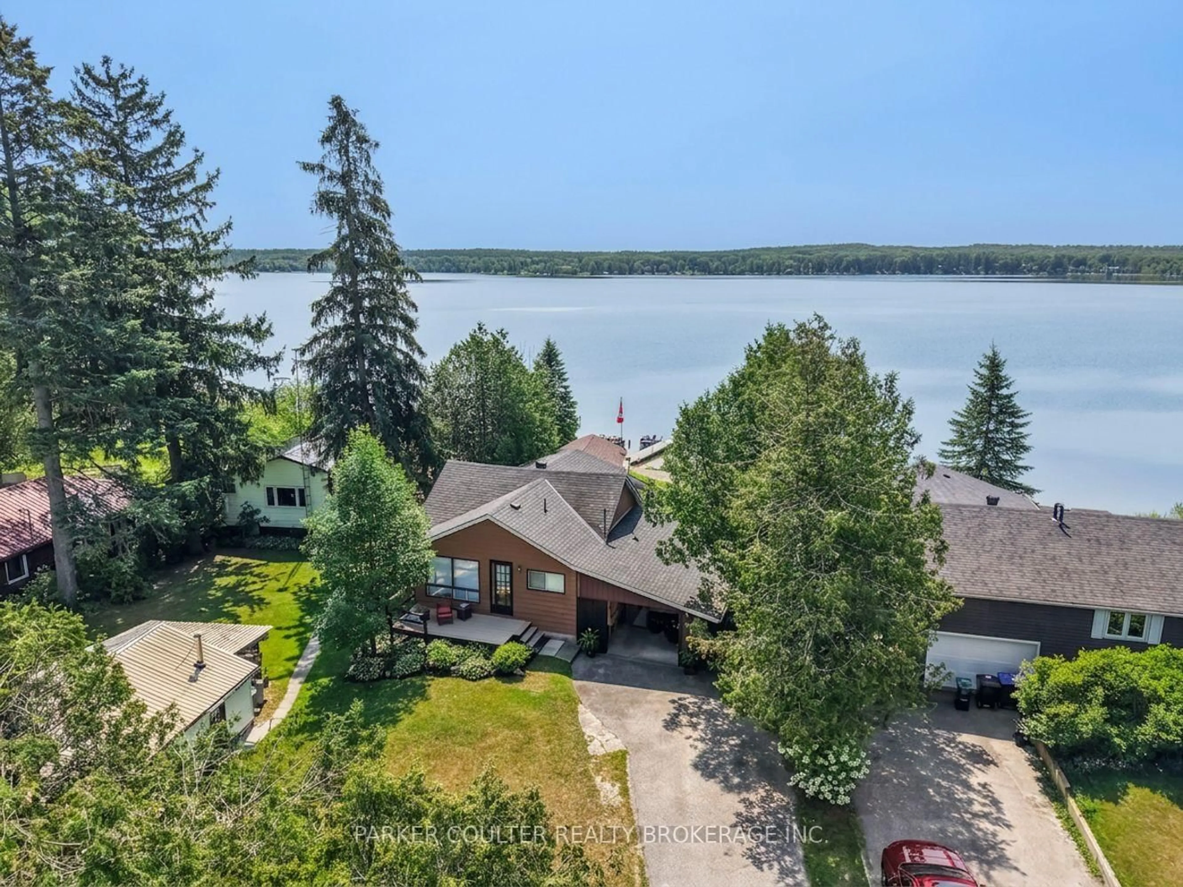 A pic from outside/outdoor area/front of a property/back of a property/a pic from drone, water/lake/river/ocean view for 2275 North Orr Lake Rd, Springwater Ontario L0L 1P0