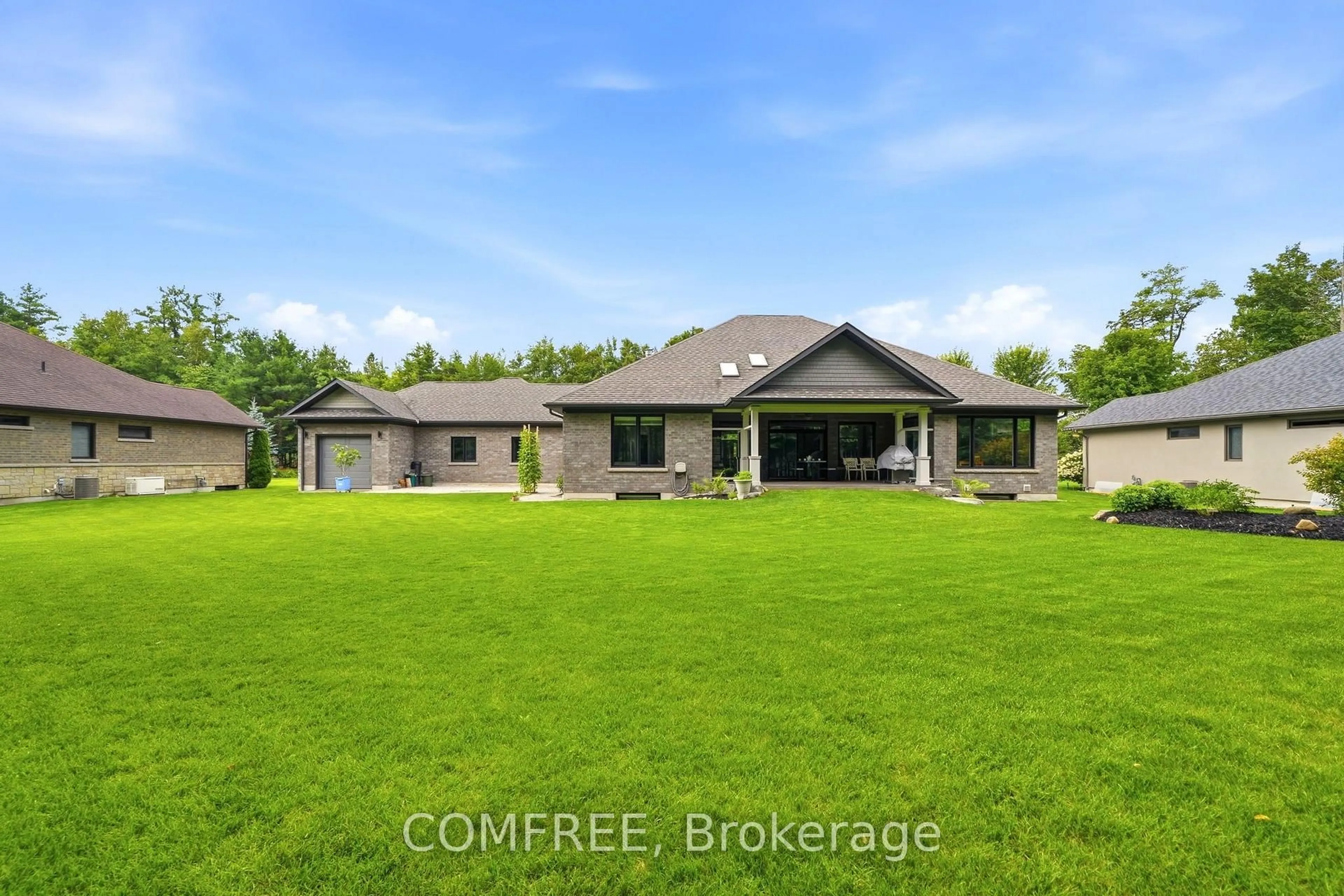 A pic from outside/outdoor area/front of a property/back of a property/a pic from drone, building for 46 Marni Lane, Springwater Ontario L0L 2K0