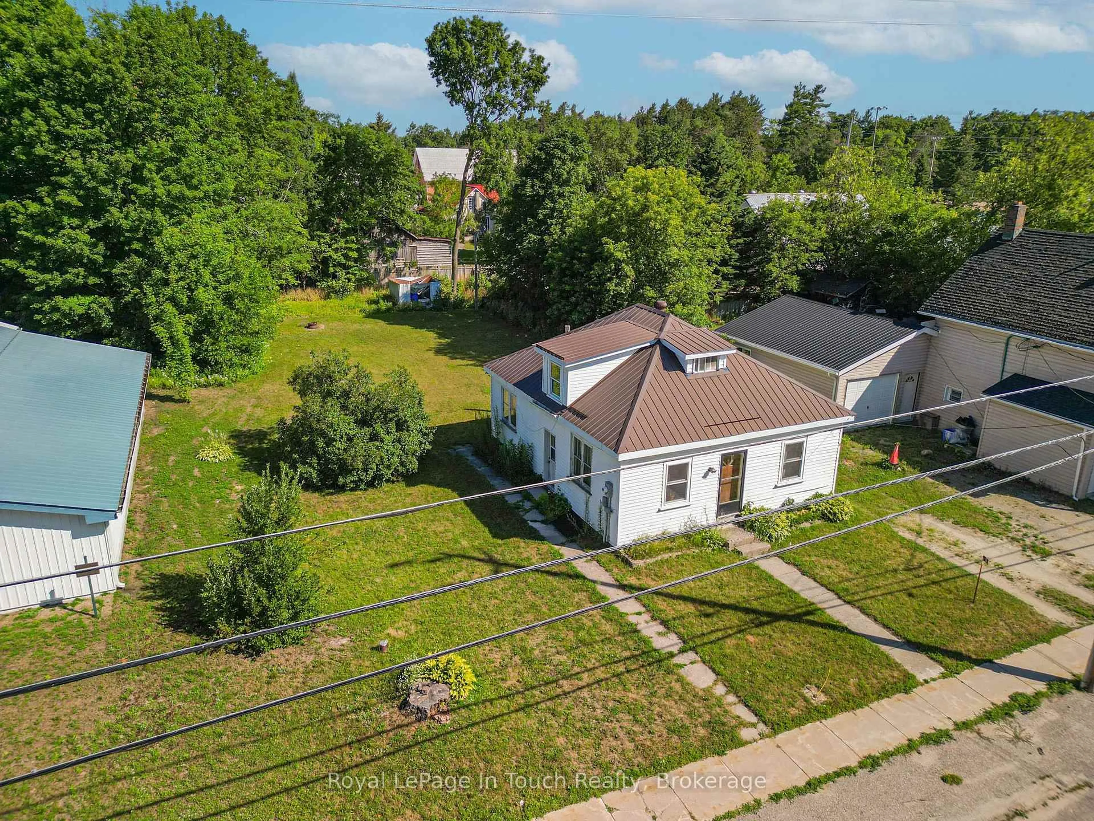 A pic from outside/outdoor area/front of a property/back of a property/a pic from drone, street for 8 Conc 5 Rd, Tiny Ontario L0L 2J0