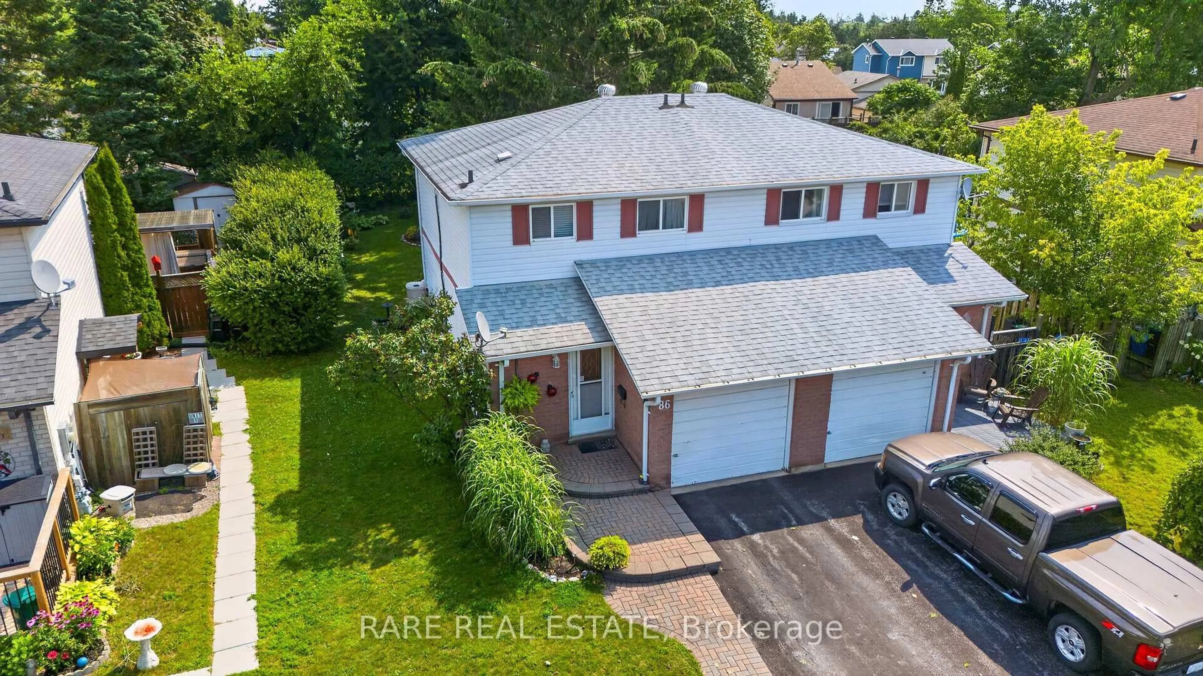 A pic from outside/outdoor area/front of a property/back of a property/a pic from drone, water/lake/river/ocean view for 86 Mowat Cres, Barrie Ontario L4N 5B3