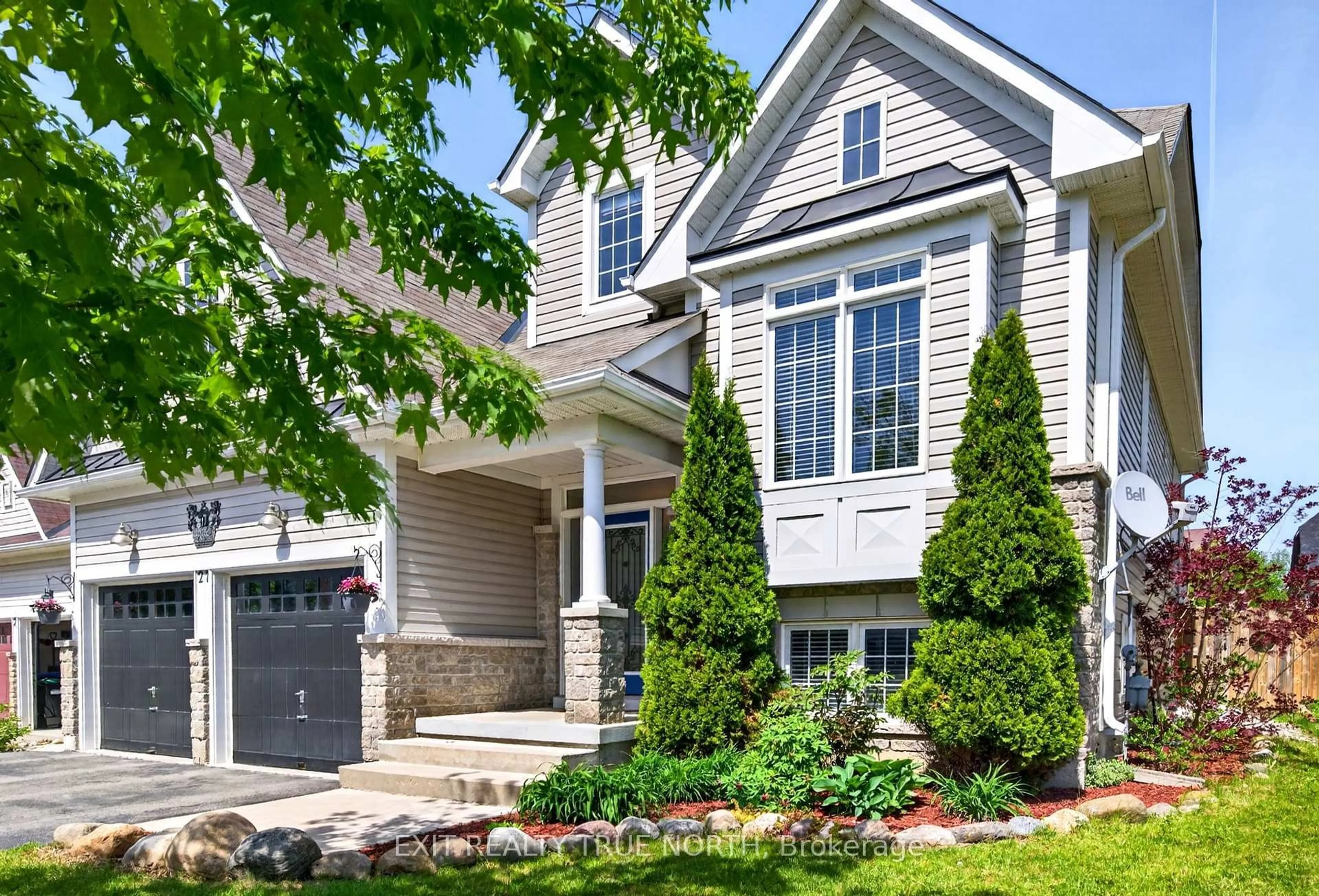 Home with brick exterior material, street for 27 Grand Poplar Lane, Wasaga Beach Ontario L9Z 0C7