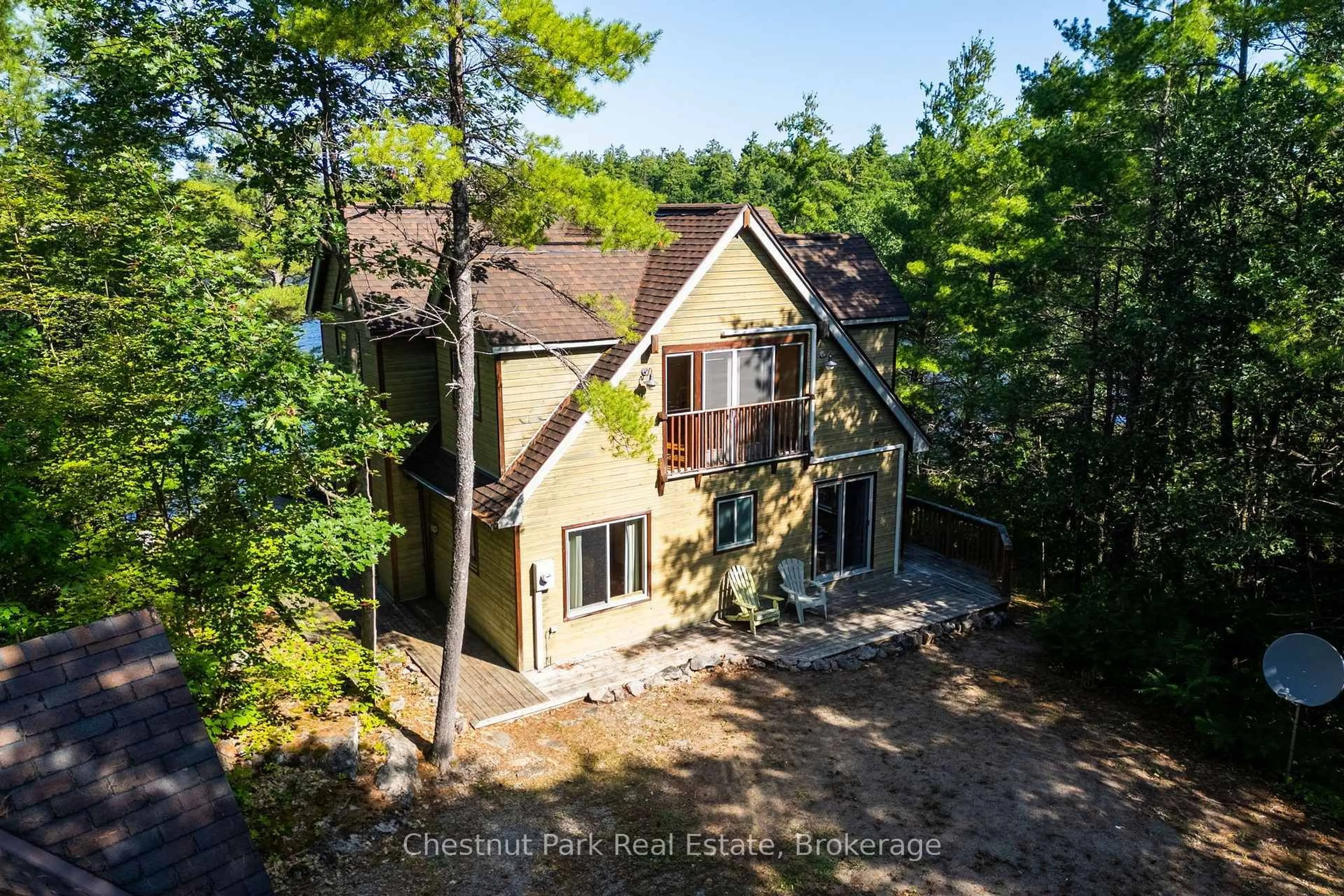 A pic from outside/outdoor area/front of a property/back of a property/a pic from drone, forest/trees view for 4296 Manton Lane, Severn Ontario L0K 1E0