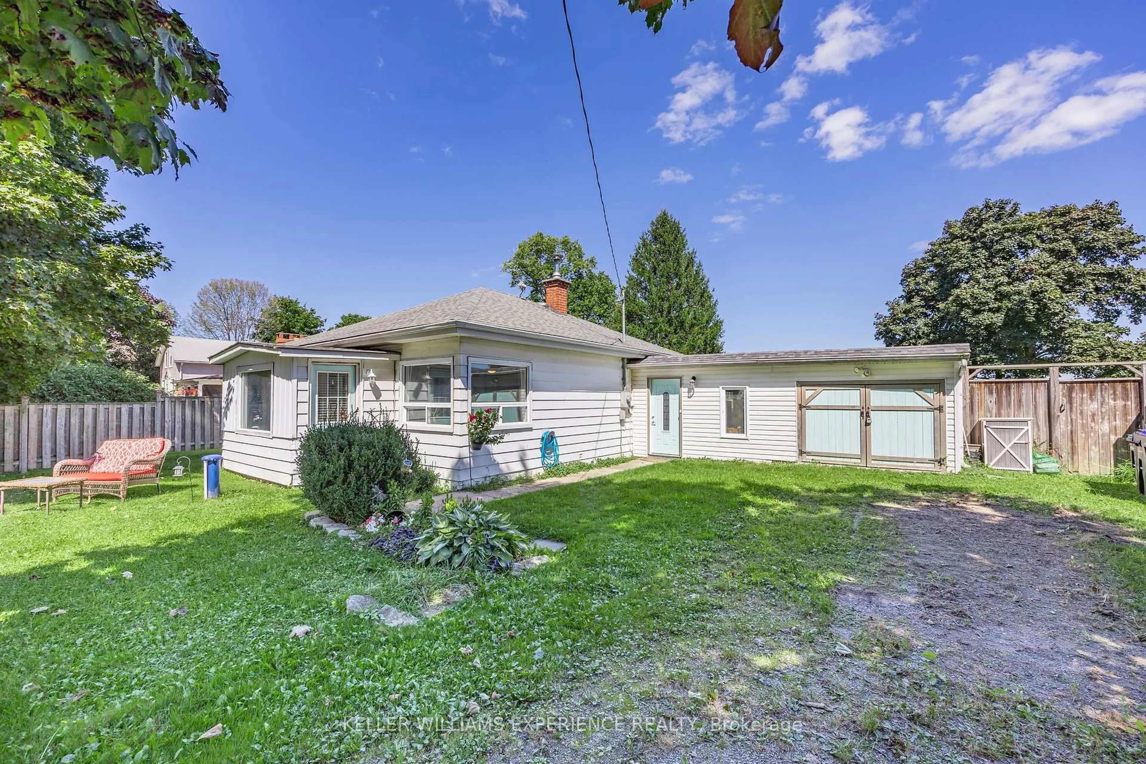 A pic from outside/outdoor area/front of a property/back of a property/a pic from drone, street for 3829 Crossland Rd, Springwater Ontario L0L 1P0