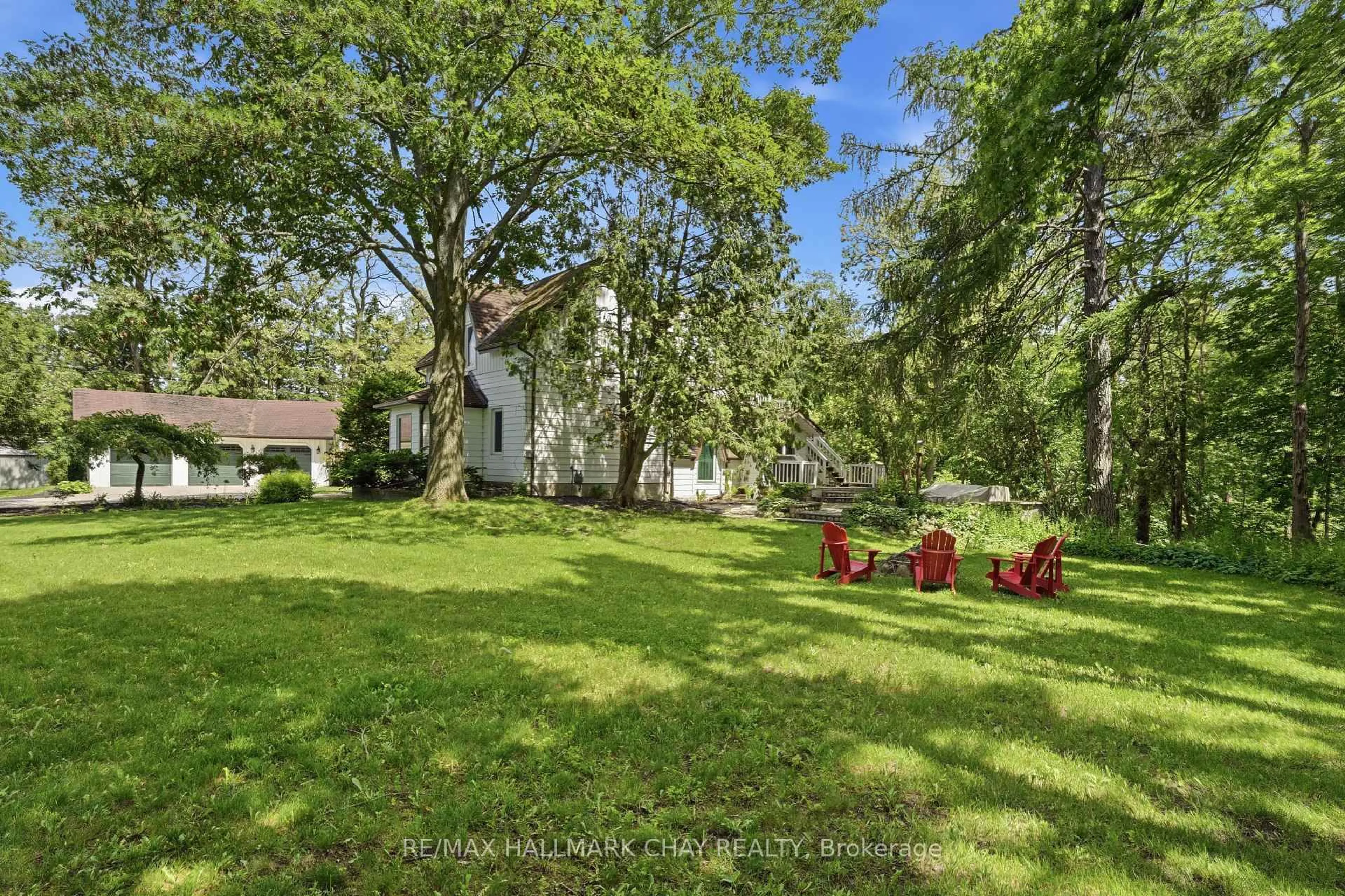 A pic from outside/outdoor area/front of a property/back of a property/a pic from drone, forest/trees view for 115 Doran Rd, Springwater Ontario L9X 1L5