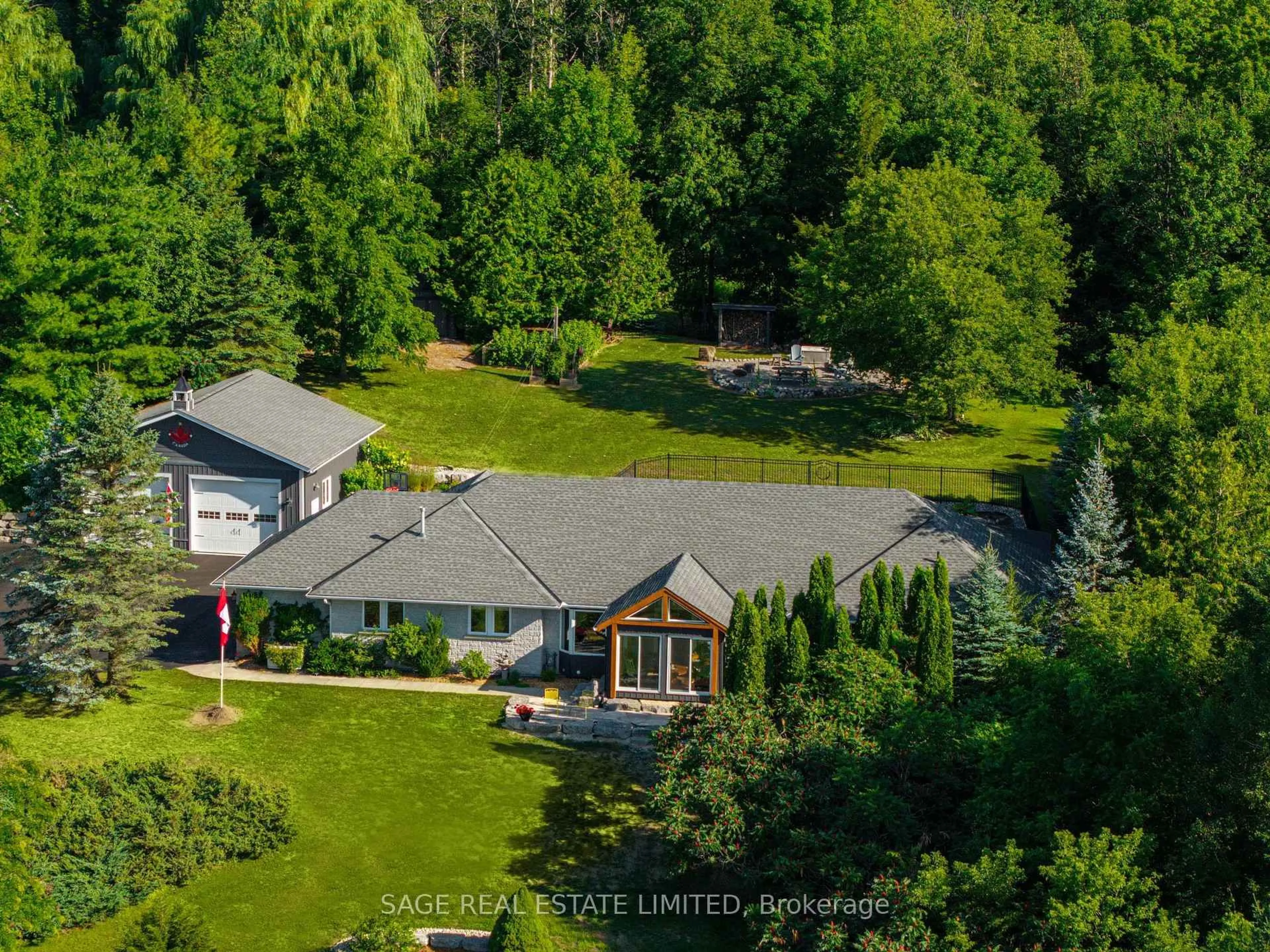 A pic from outside/outdoor area/front of a property/back of a property/a pic from drone, mountain view for 7632 County 9 Rd, Clearview Ontario L0M 1G0