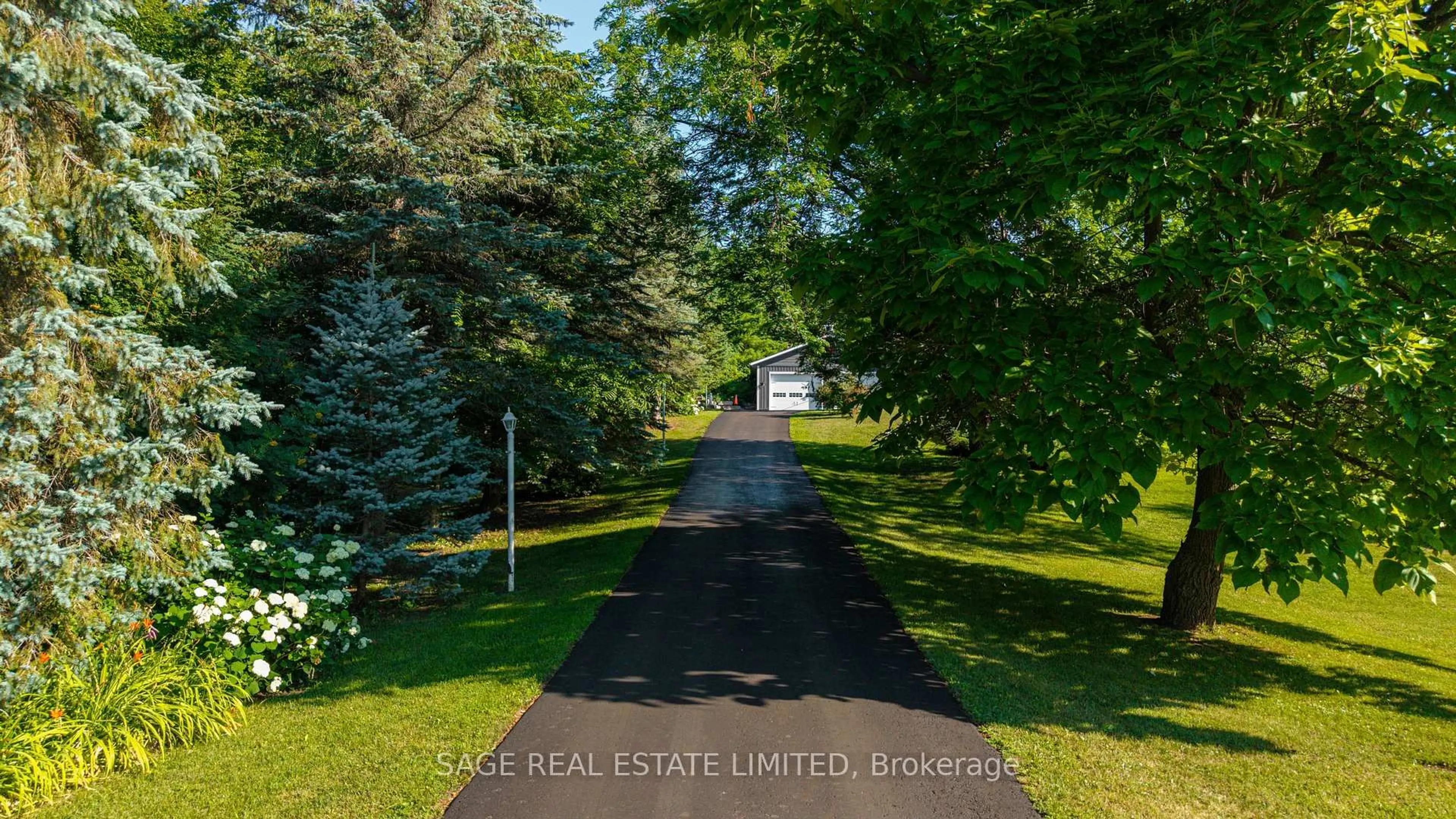 A pic from outside/outdoor area/front of a property/back of a property/a pic from drone, street for 7632 County 9 Rd, Clearview Ontario L0M 1G0