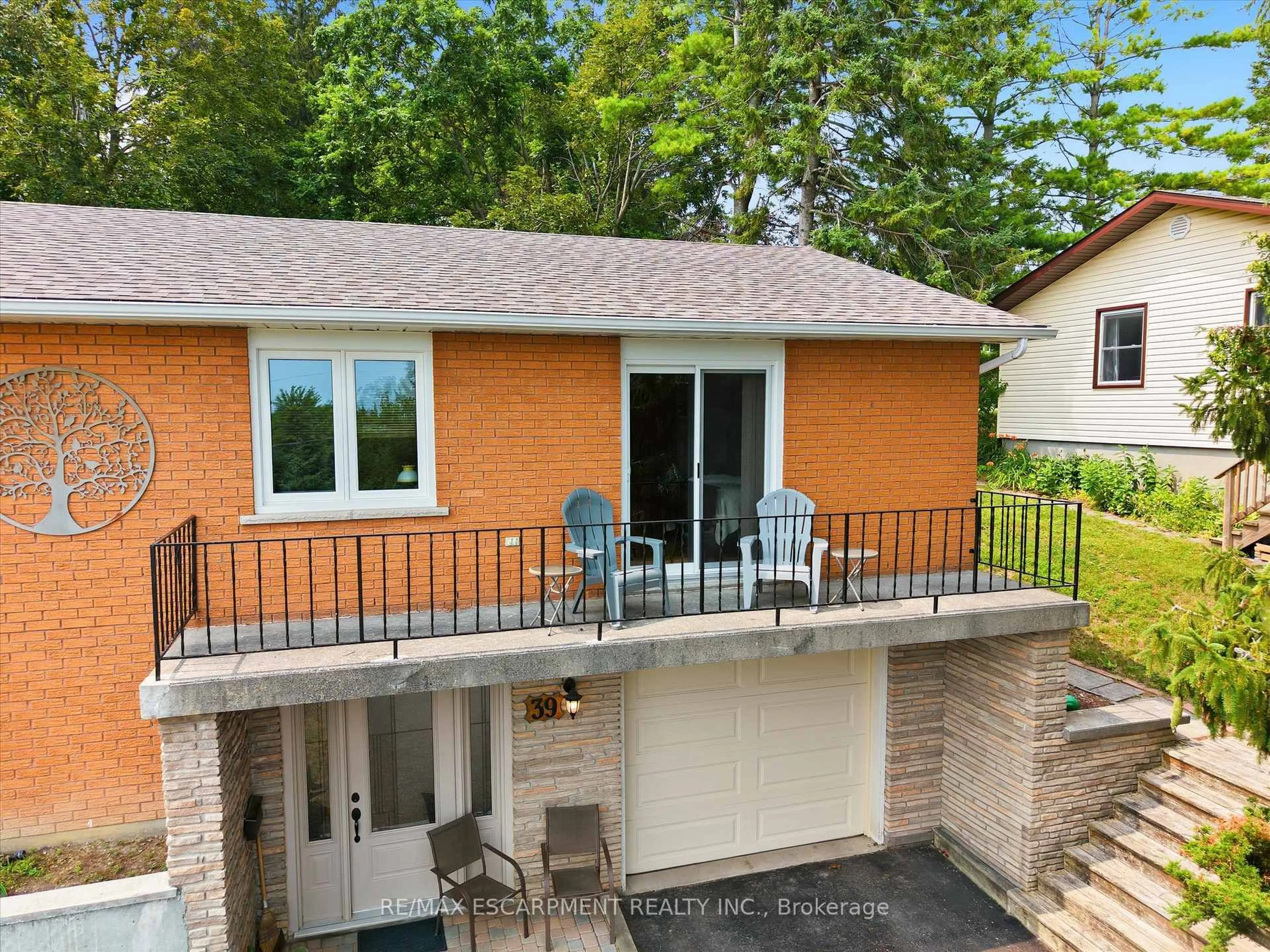 Home with brick exterior material, street for 39 Orma Dr, Orillia Ontario L3V 4J7