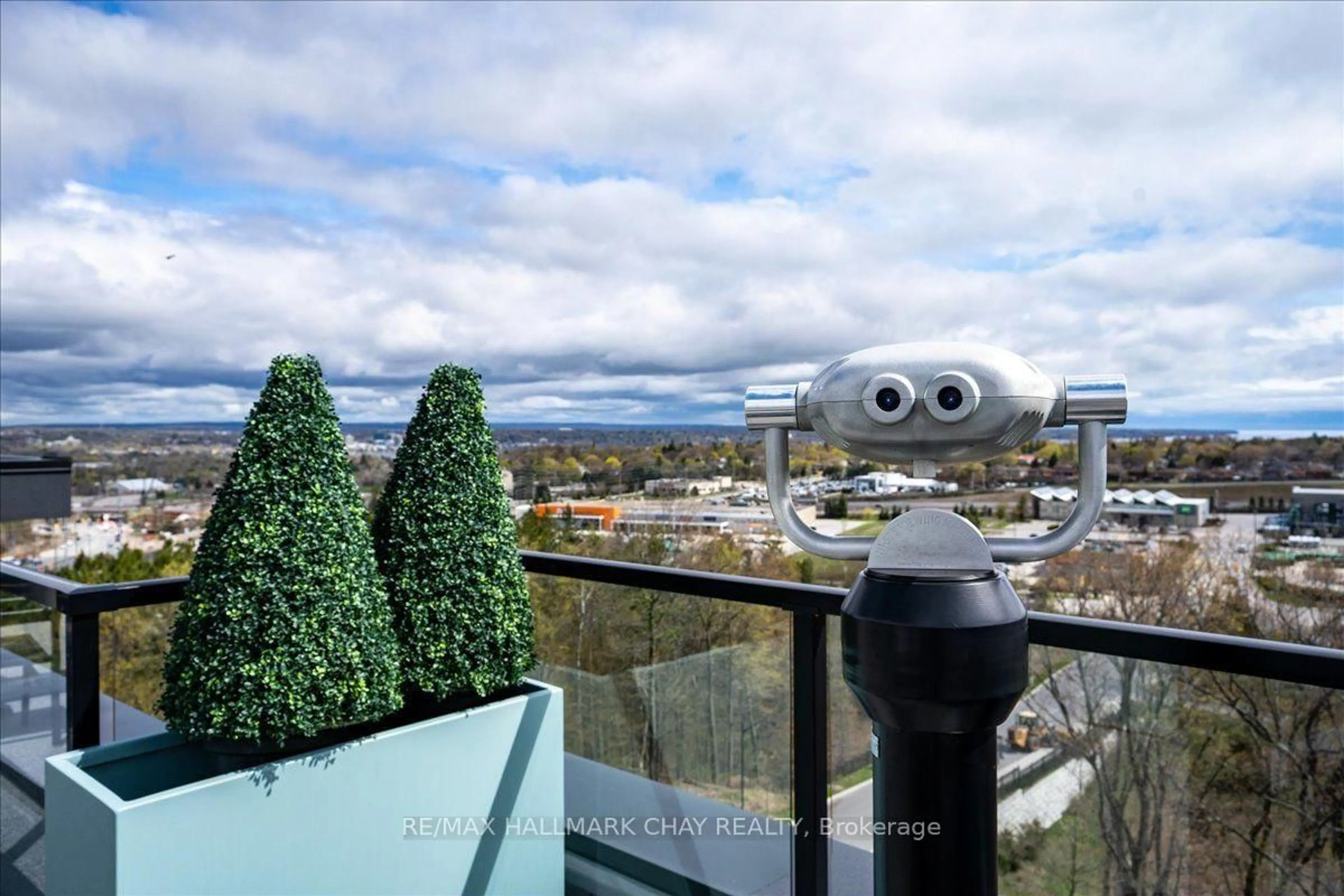 A pic from outside/outdoor area/front of a property/back of a property/a pic from drone, city buildings view from balcony for 302 Essa Rd #203, Barrie Ontario L9J 0H3