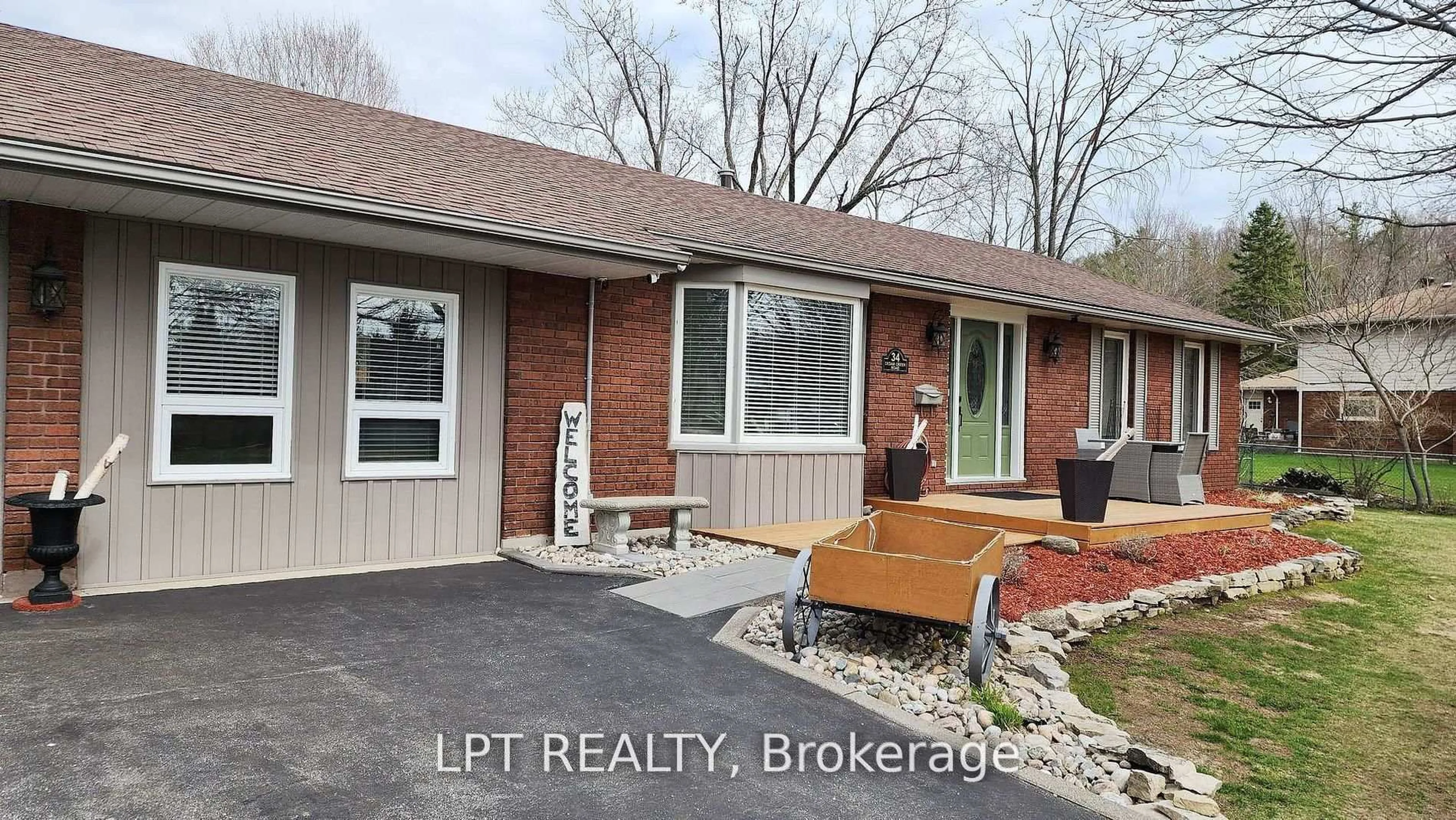 Home with brick exterior material, street for 34 Cedar Creek Rd, Springwater Ontario L9X 0P5