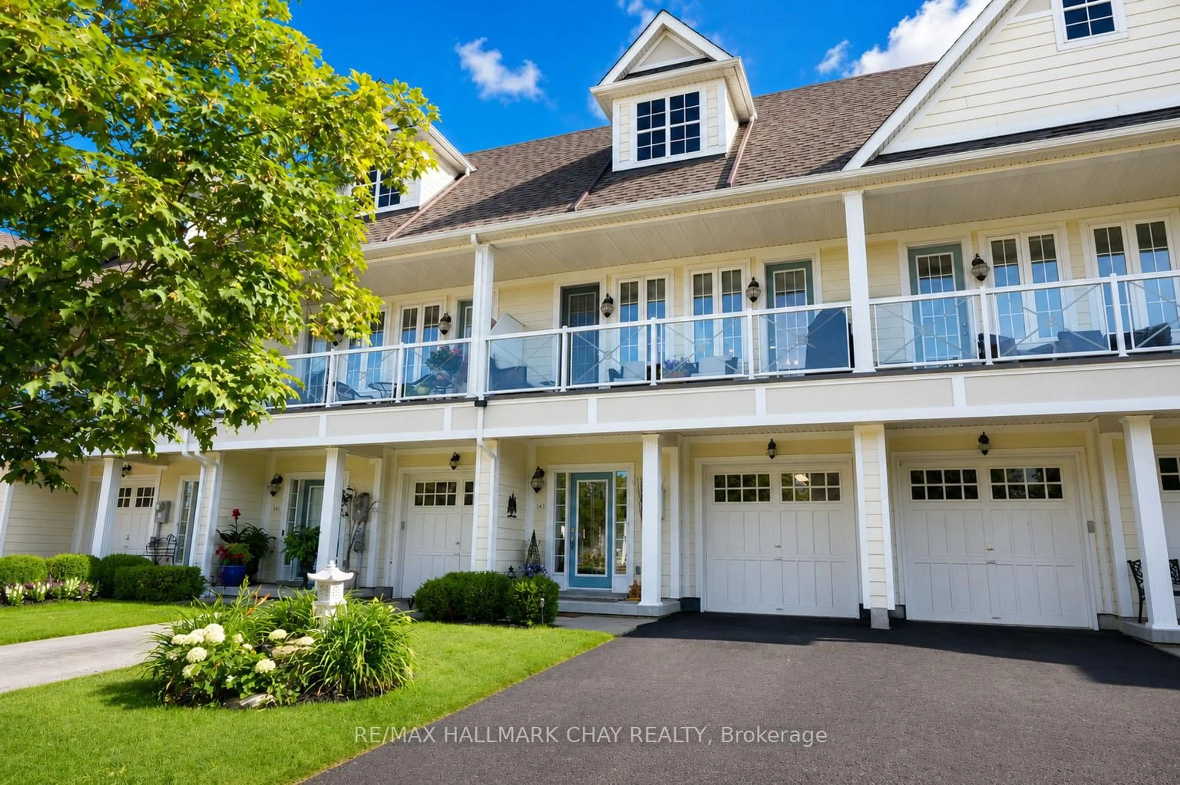 Home with vinyl exterior material, street for 143 Wycliffe Cove St, Tay Ontario L0K 2A0